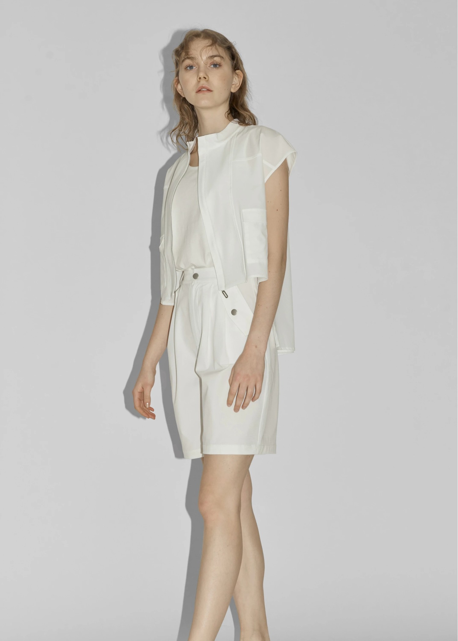 irregular hem flap pocket zip tops