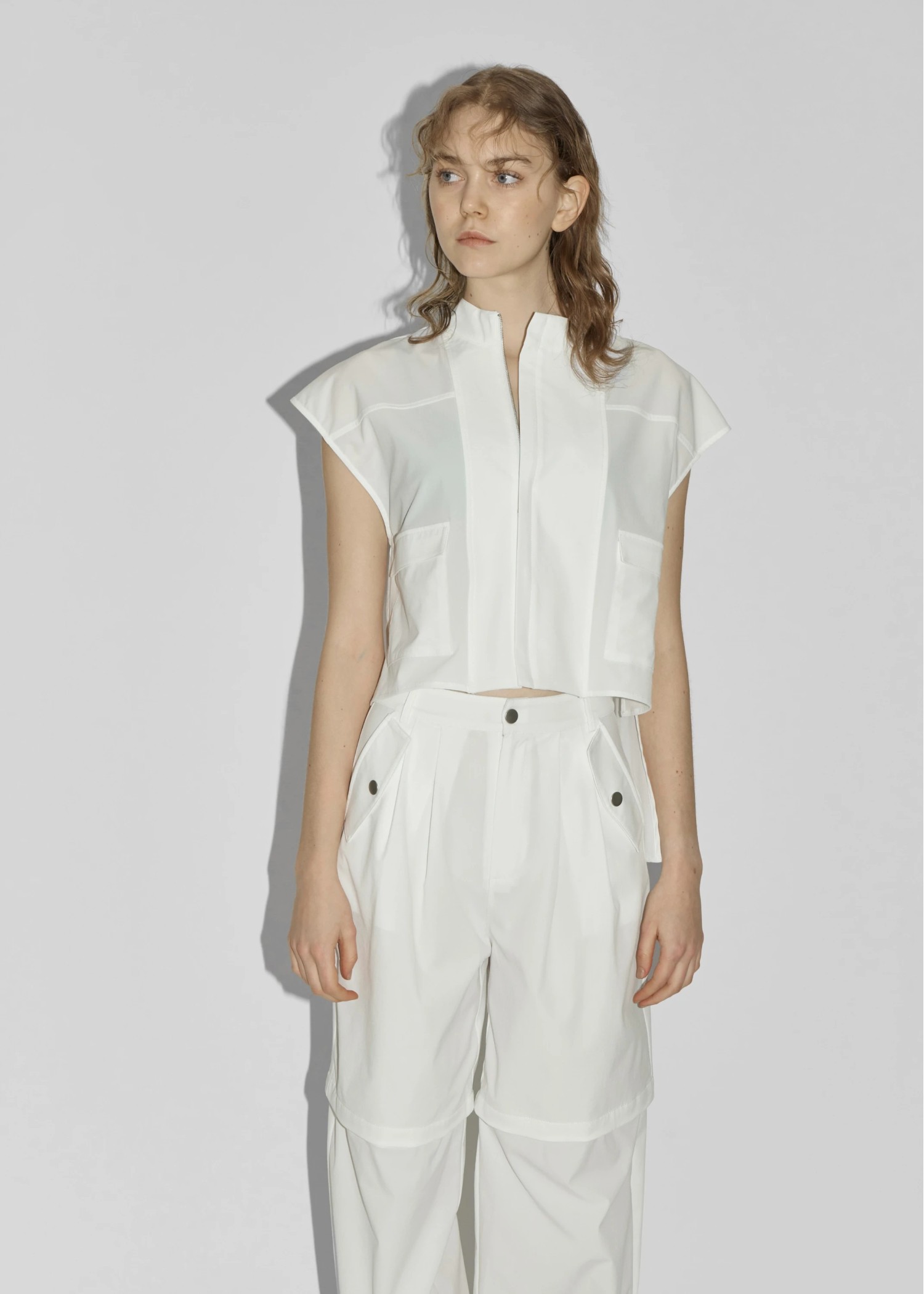 irregular hem flap pocket zip tops