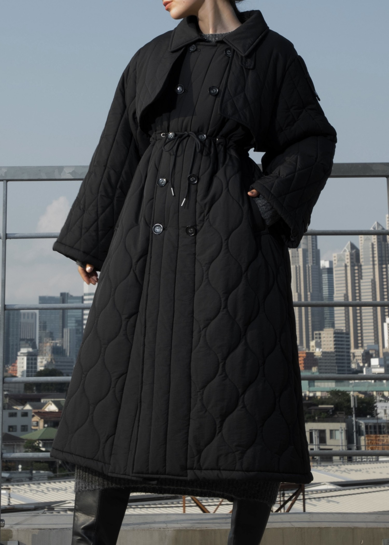 traverse quilting trench detail coat