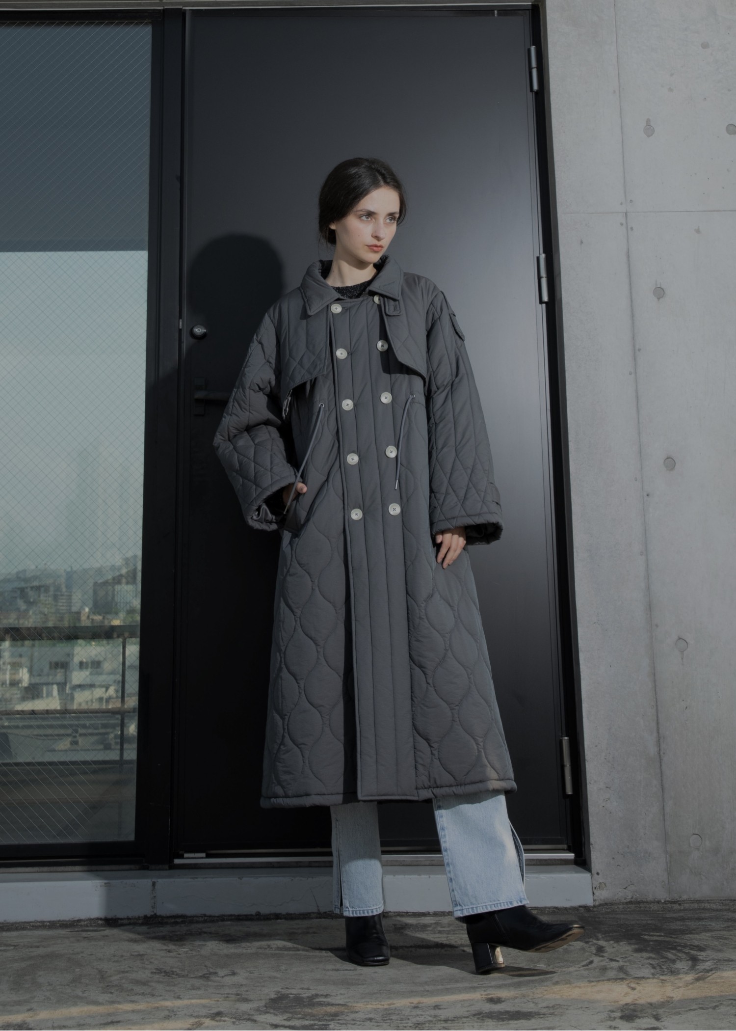 traverse quilting trench detail coat