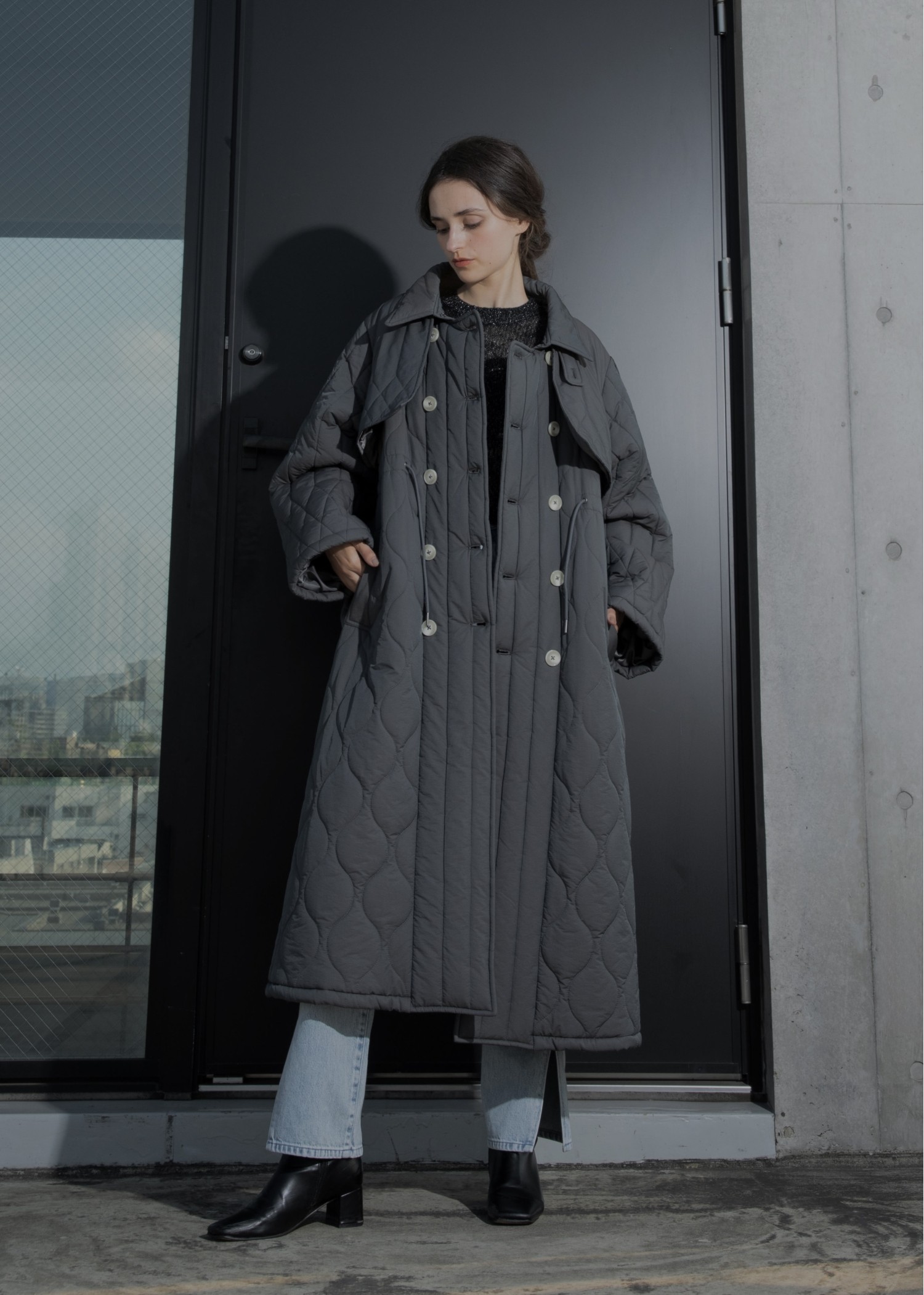 traverse quilting trench detail coat