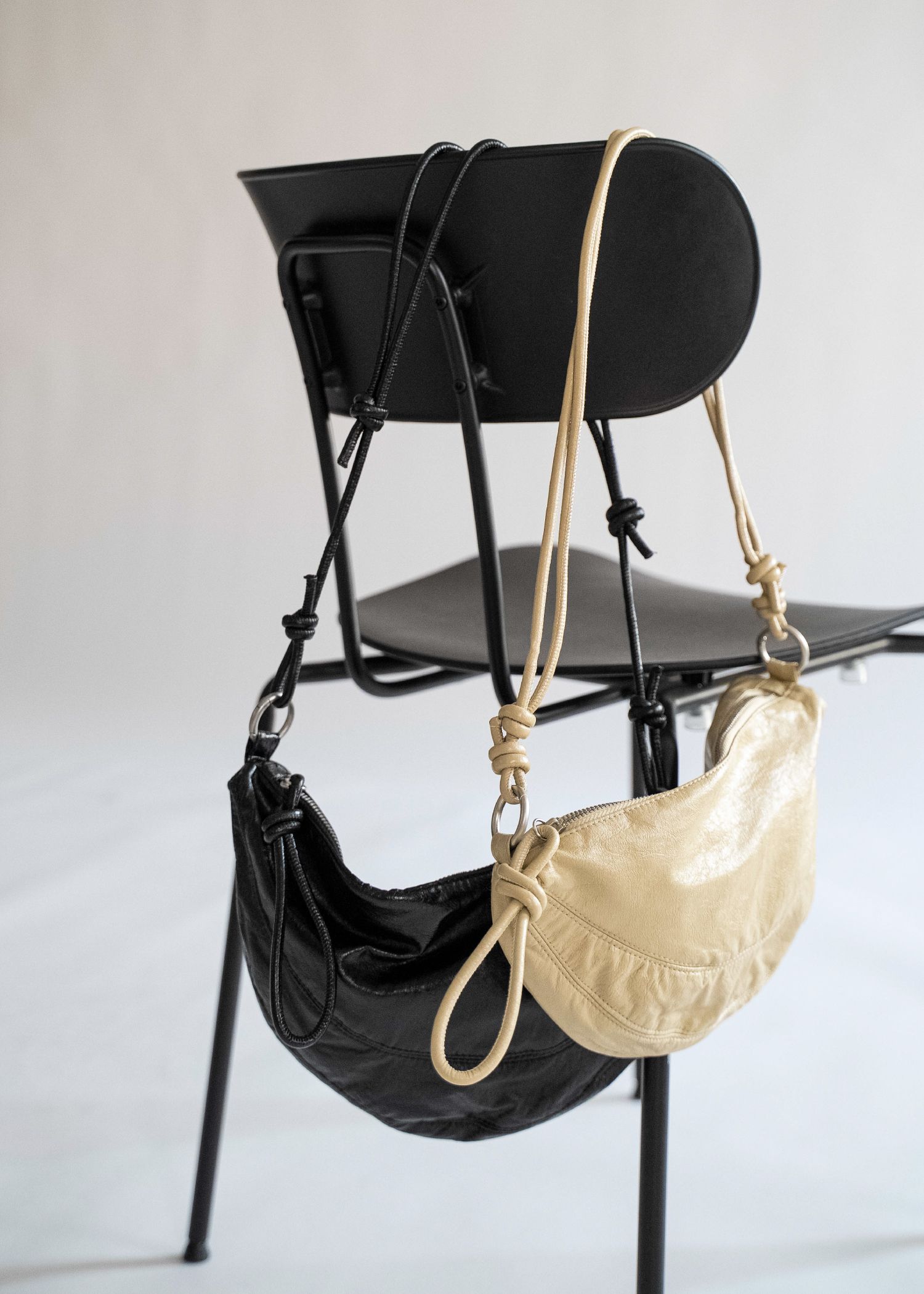 knotted strap half moon bag