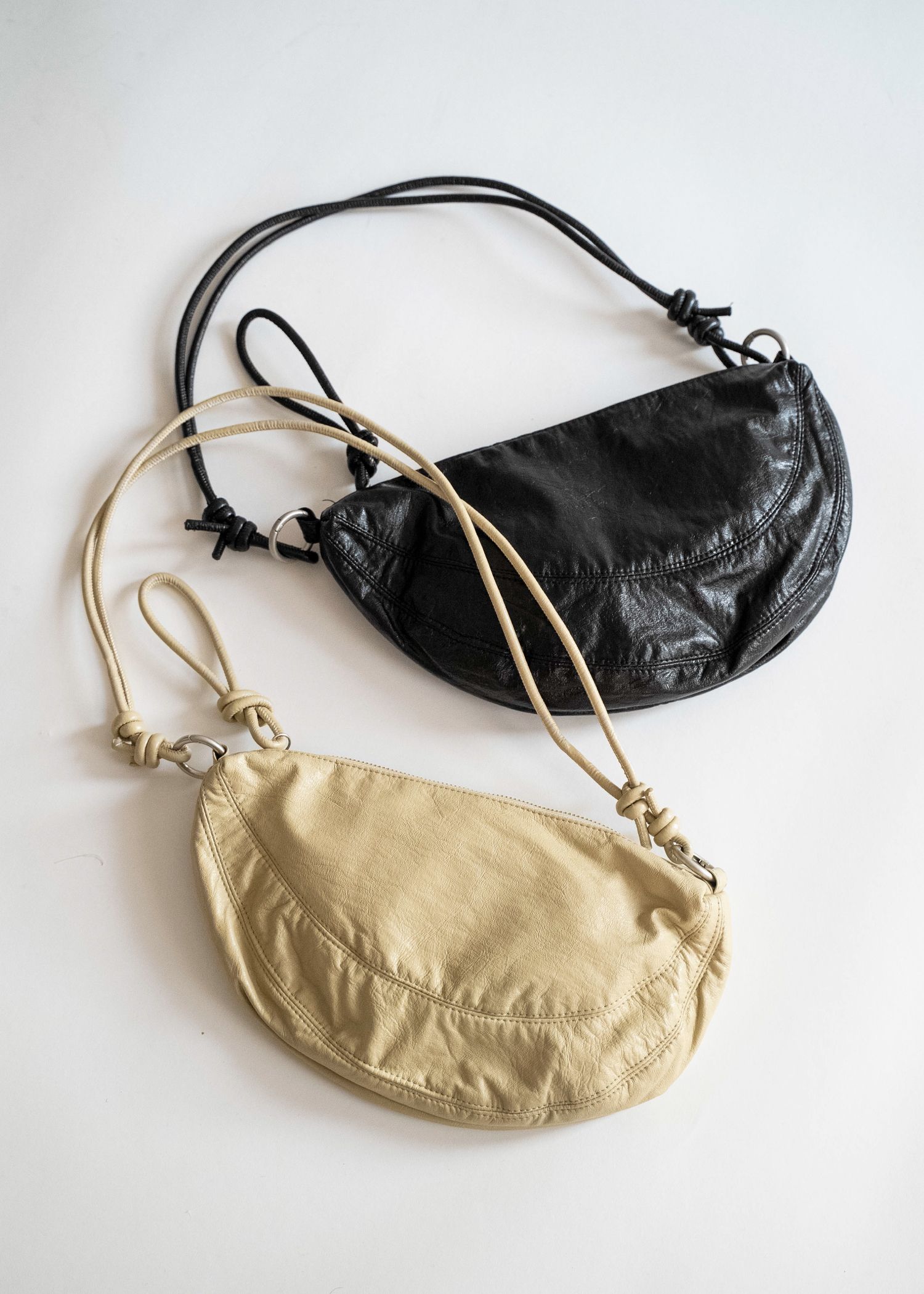 knotted strap half moon bag