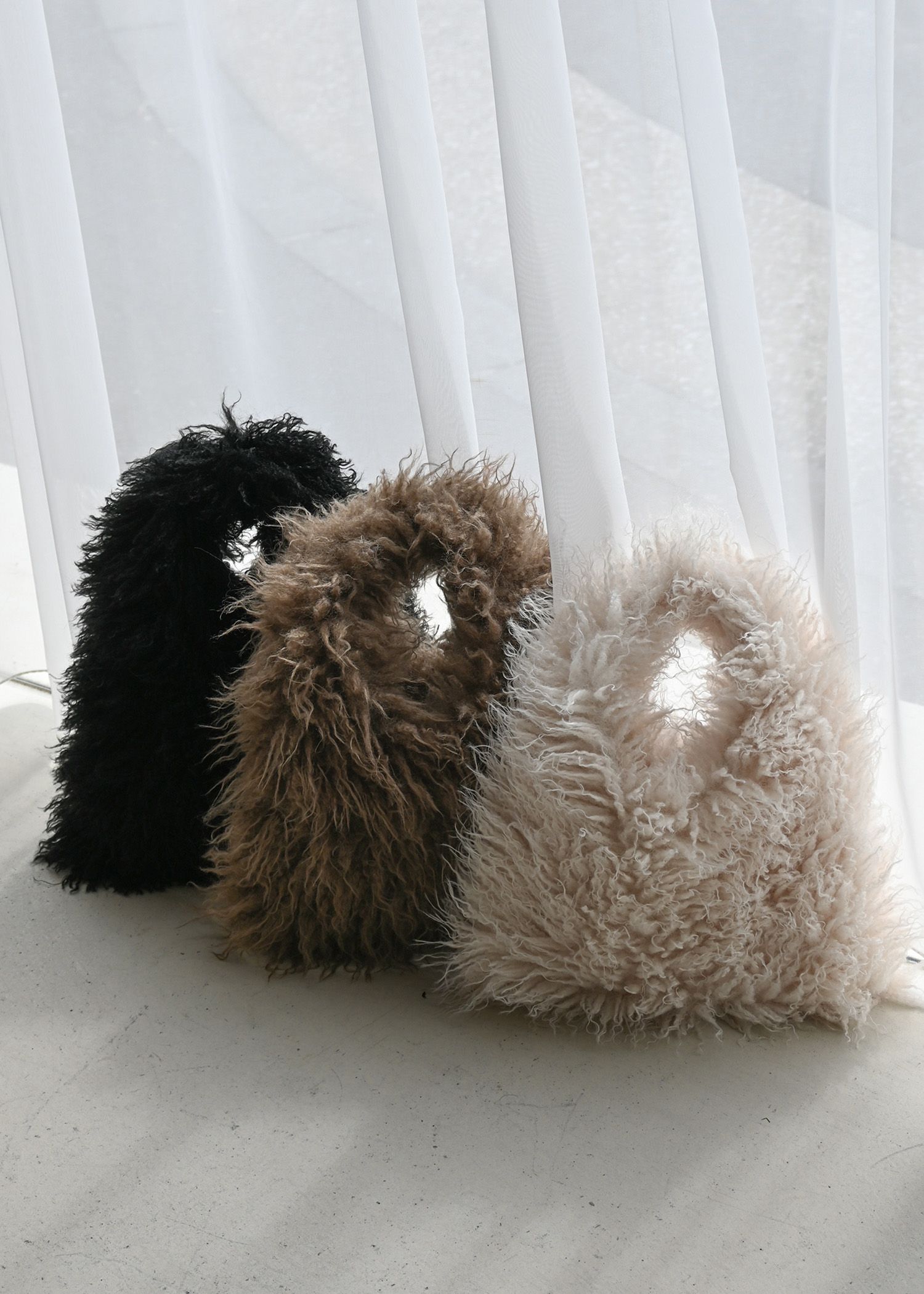frizzy fur yeti bag