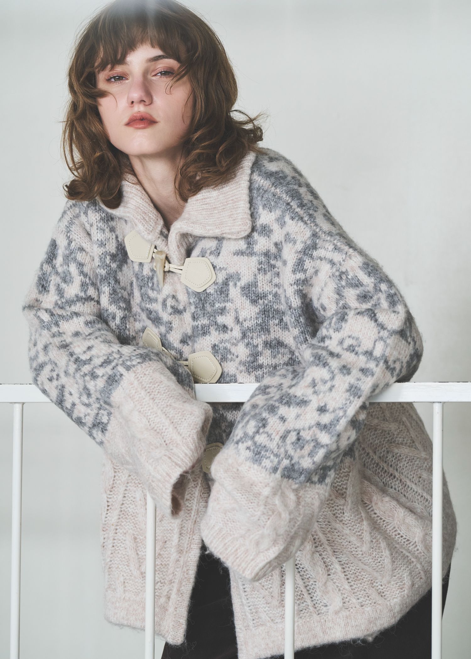 jacquard & cable placement toggle knit