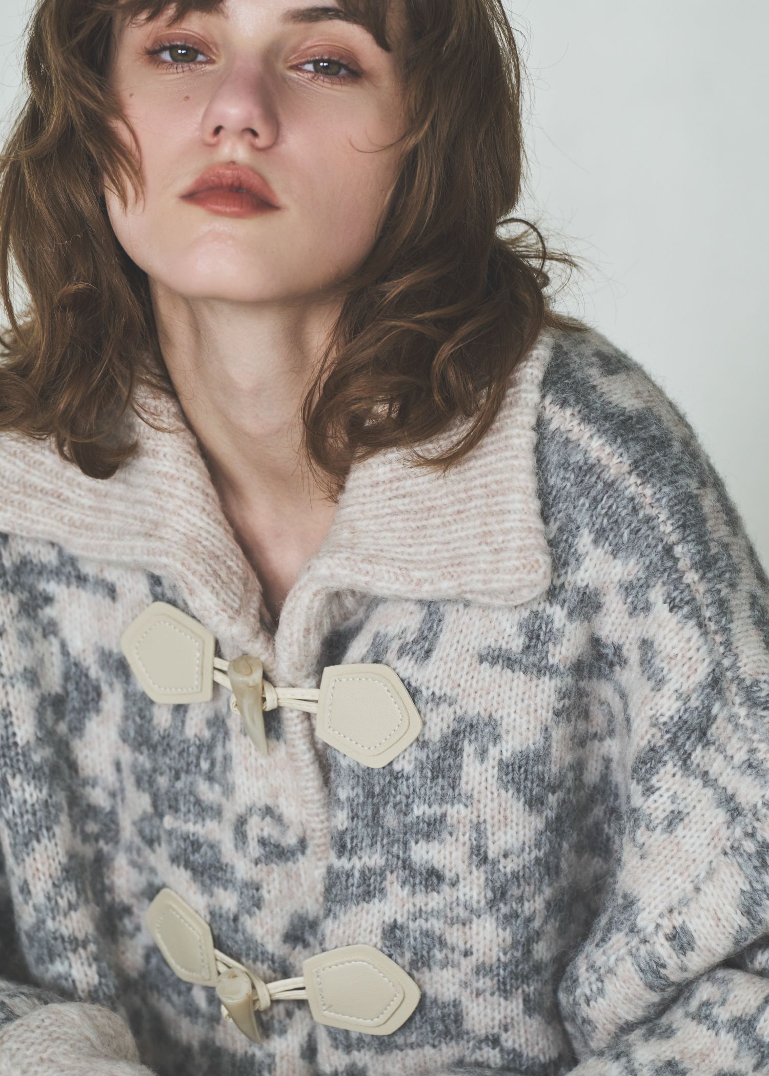 jacquard & cable placement toggle knit