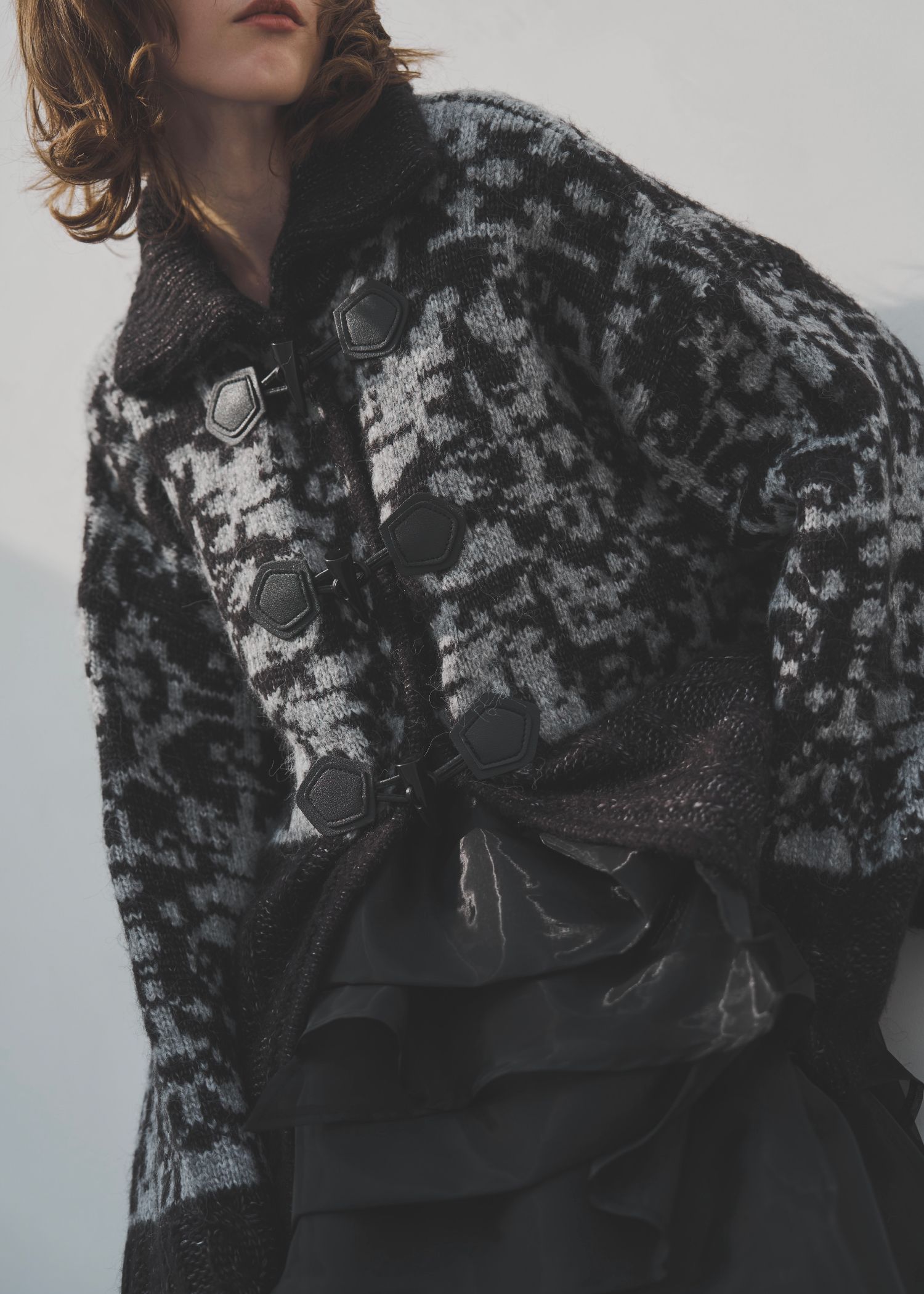 jacquard & cable placement toggle knit