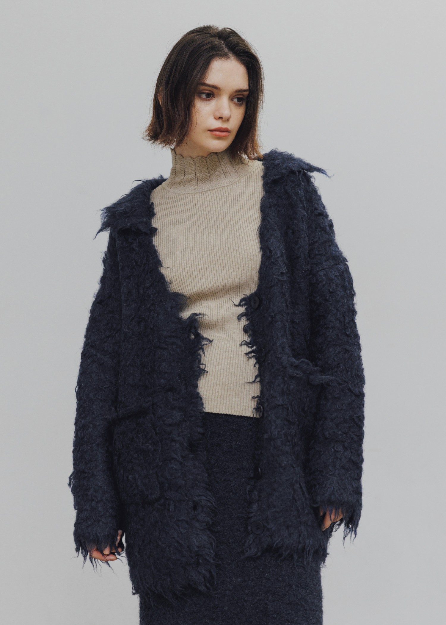 scallop high neck flare sleeve knit