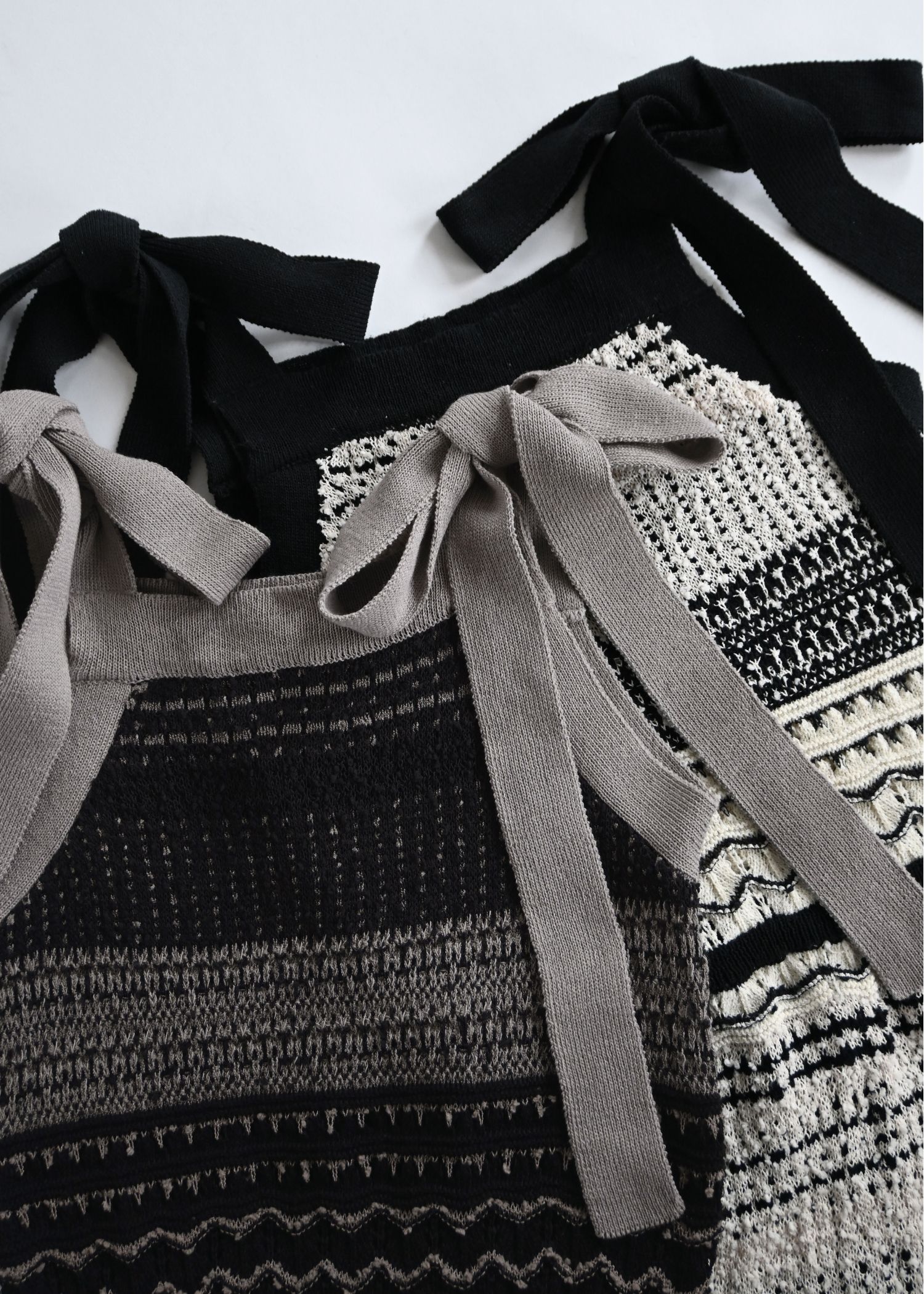 at random geometric pattern knit all-in-one