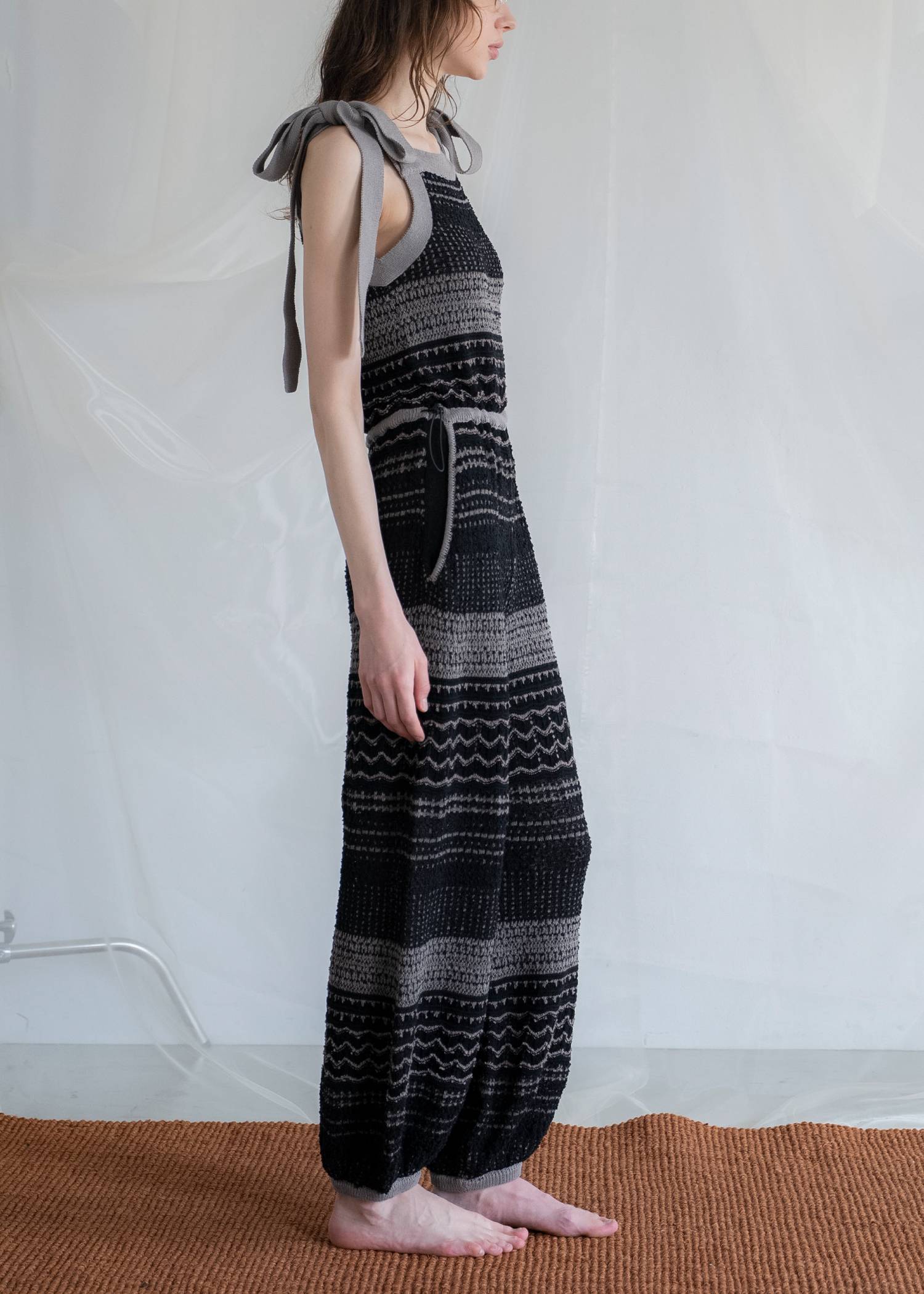 at random geometric pattern knit all-in-one