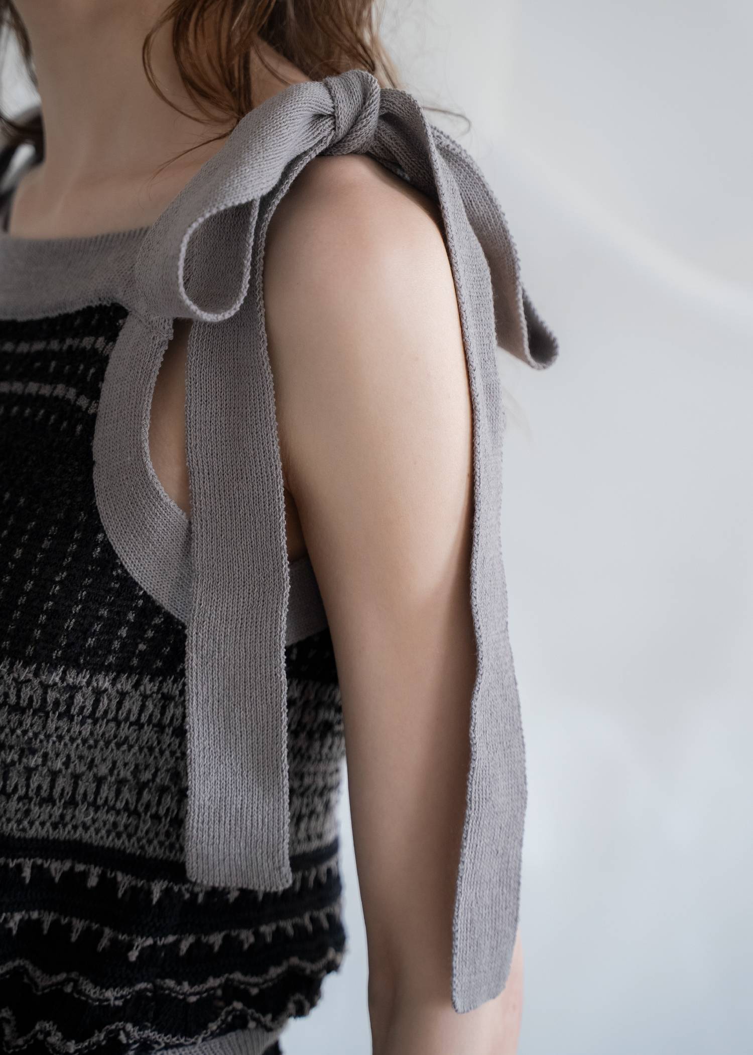 at random geometric pattern knit all-in-one