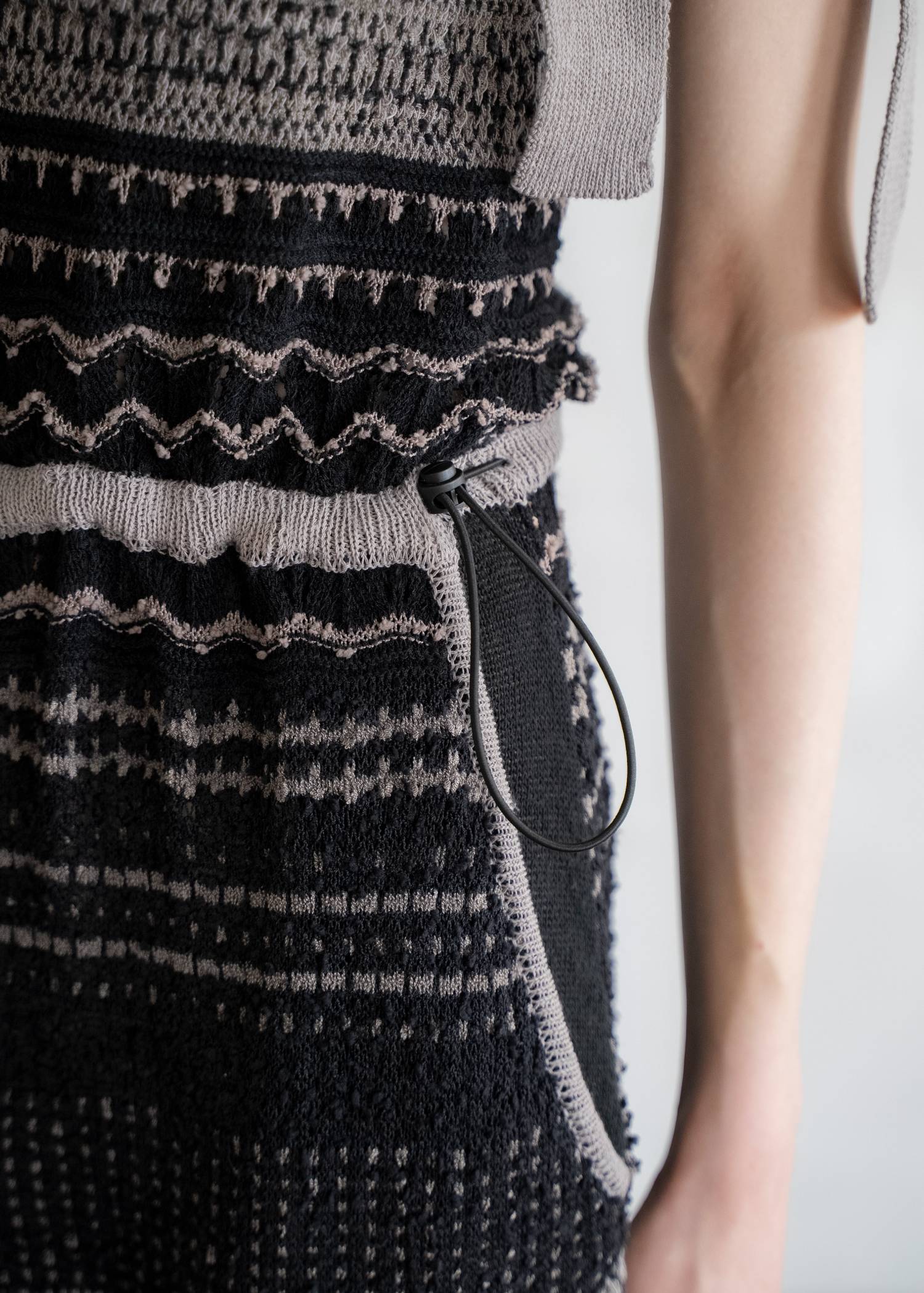 at random geometric pattern knit all-in-one