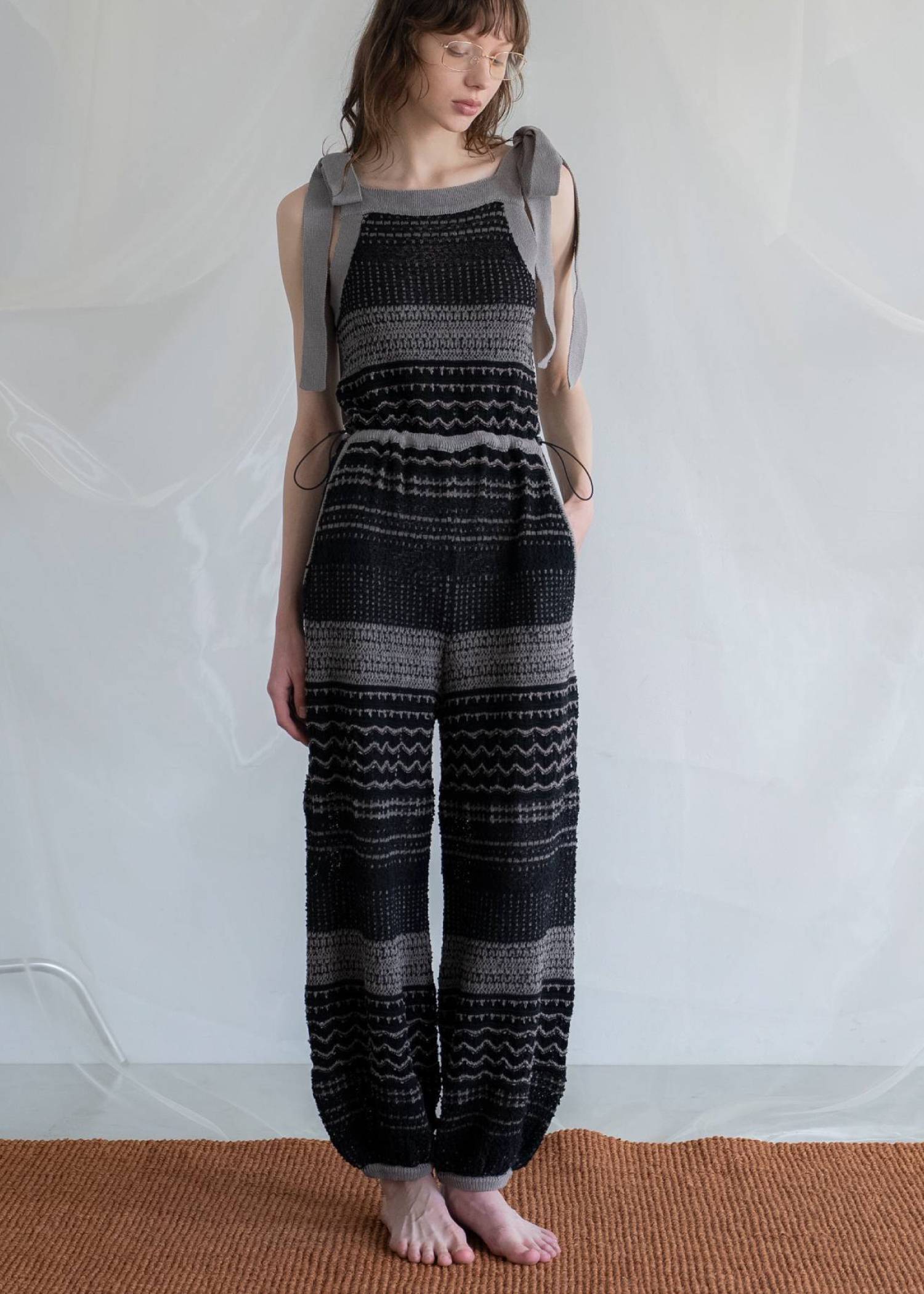 at random geometric pattern knit all-in-one