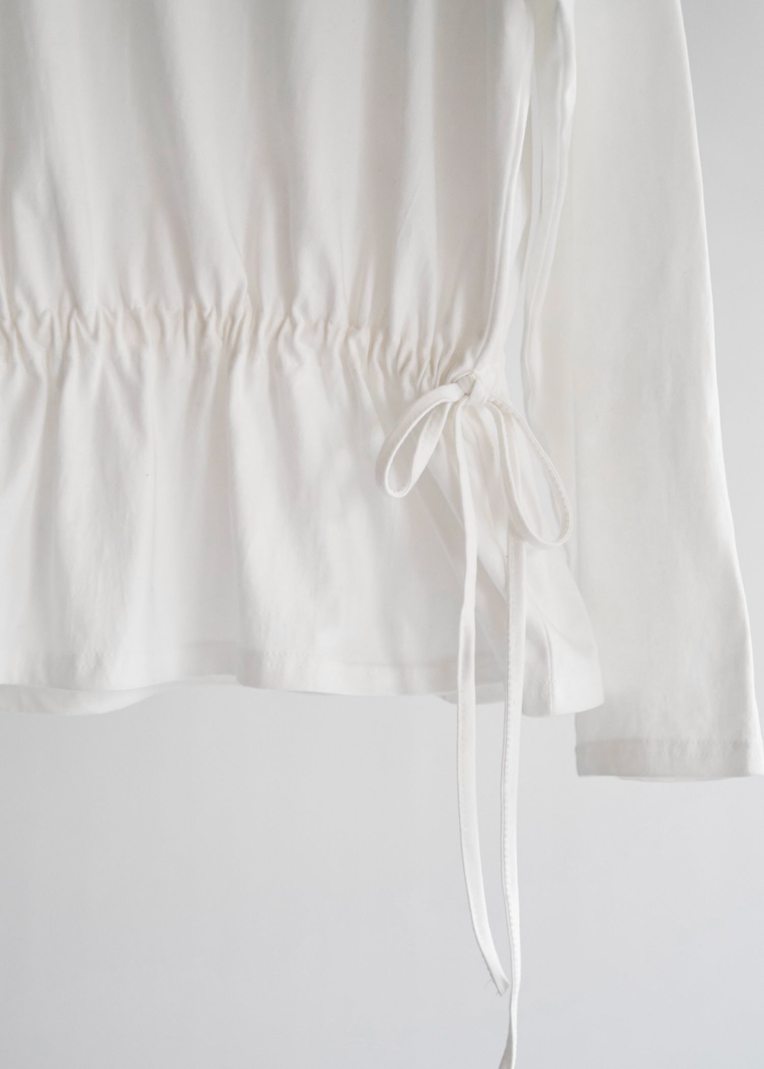 drawstring over size cut and sew tops