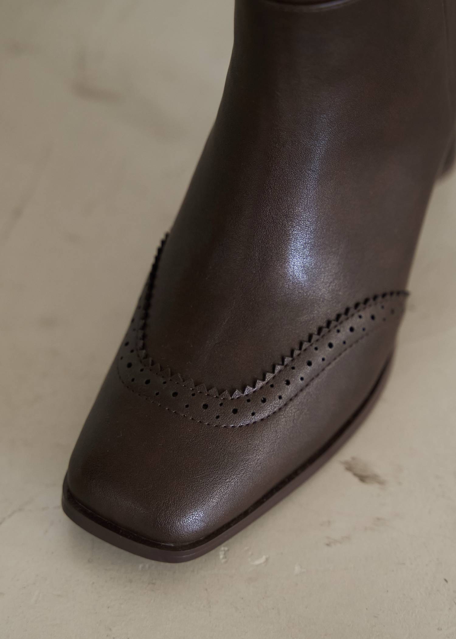 punching scallop design boots