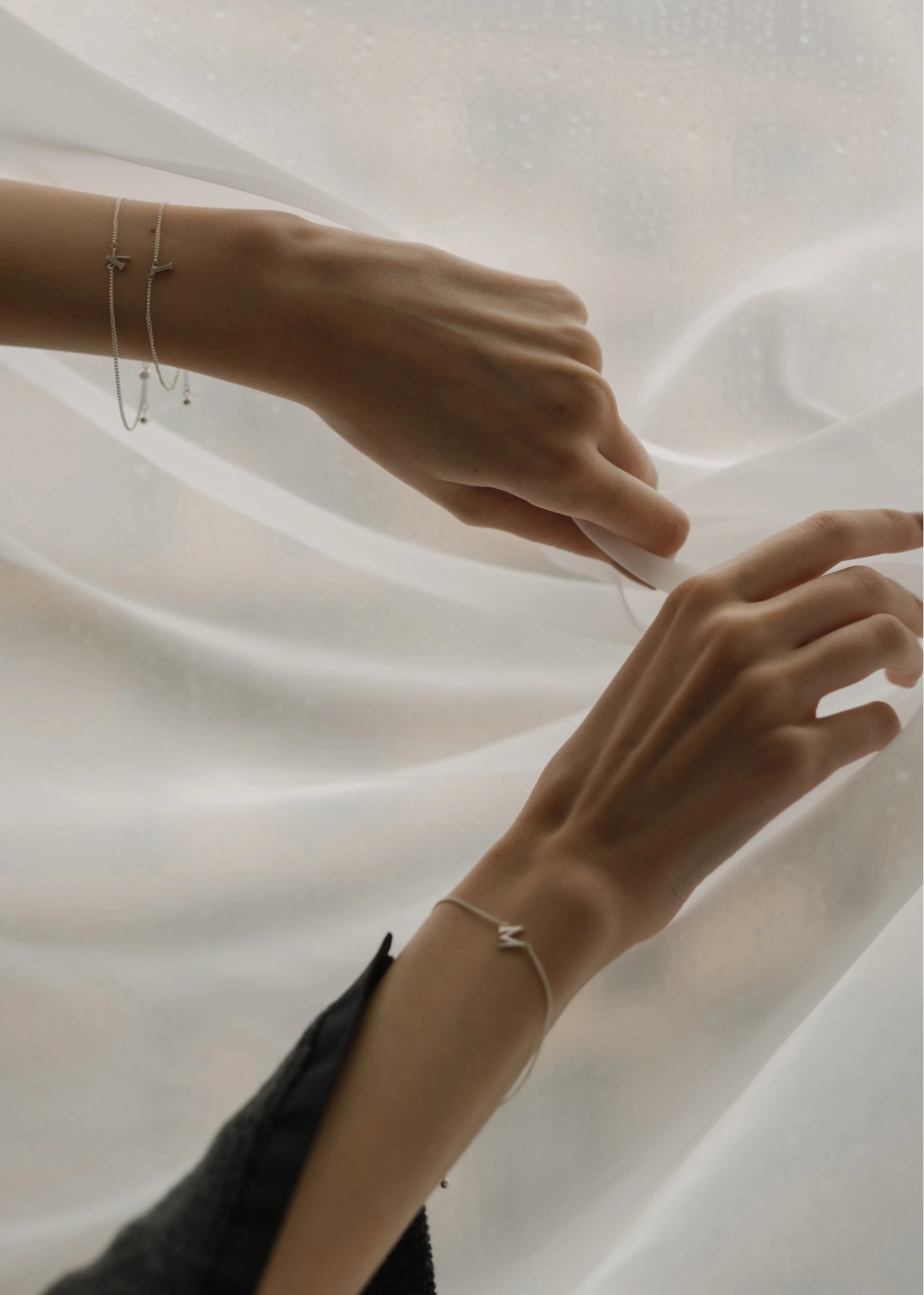 unstable initial motif bracelet