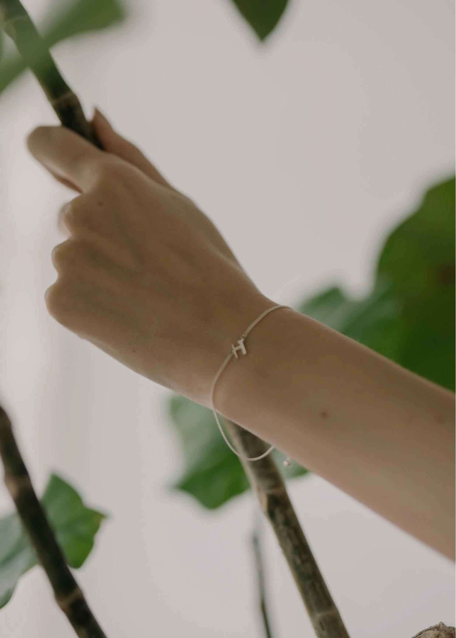 unstable initial motif bracelet