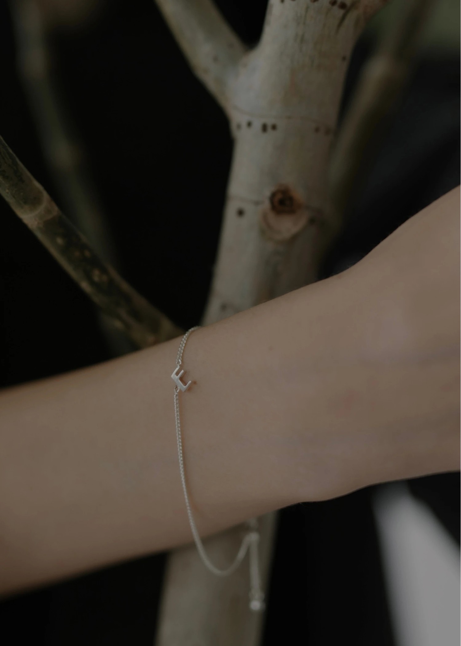 unstable initial motif bracelet