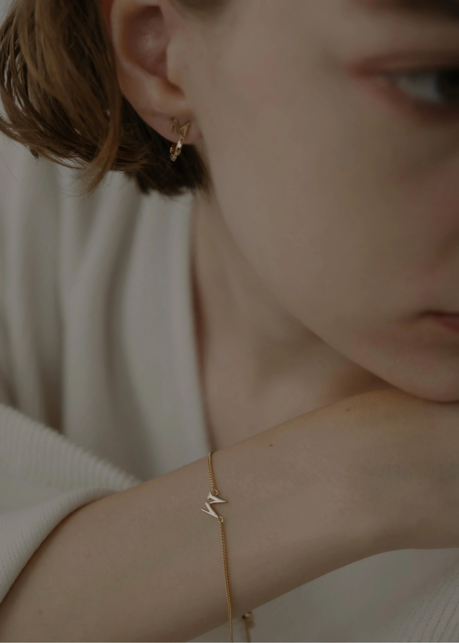 unstable initial motif bracelet