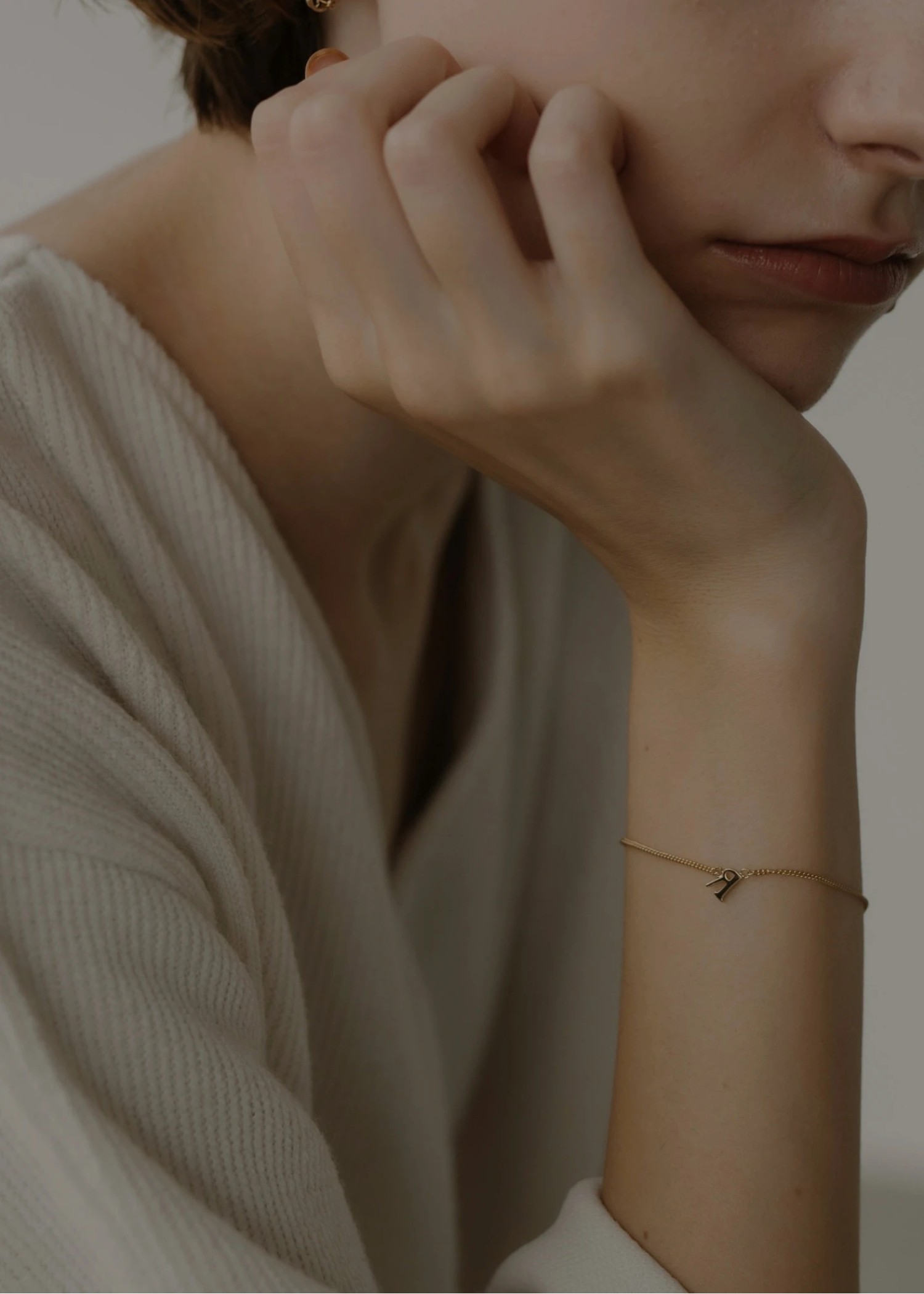 unstable initial motif bracelet