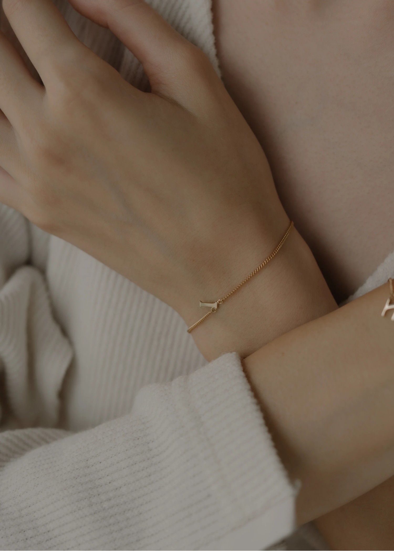 unstable initial motif bracelet