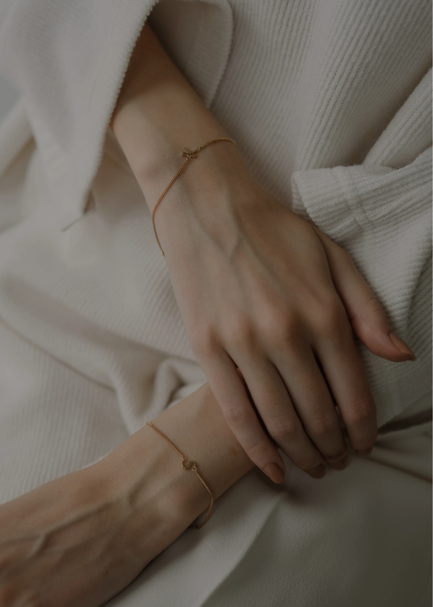 unstable initial motif bracelet