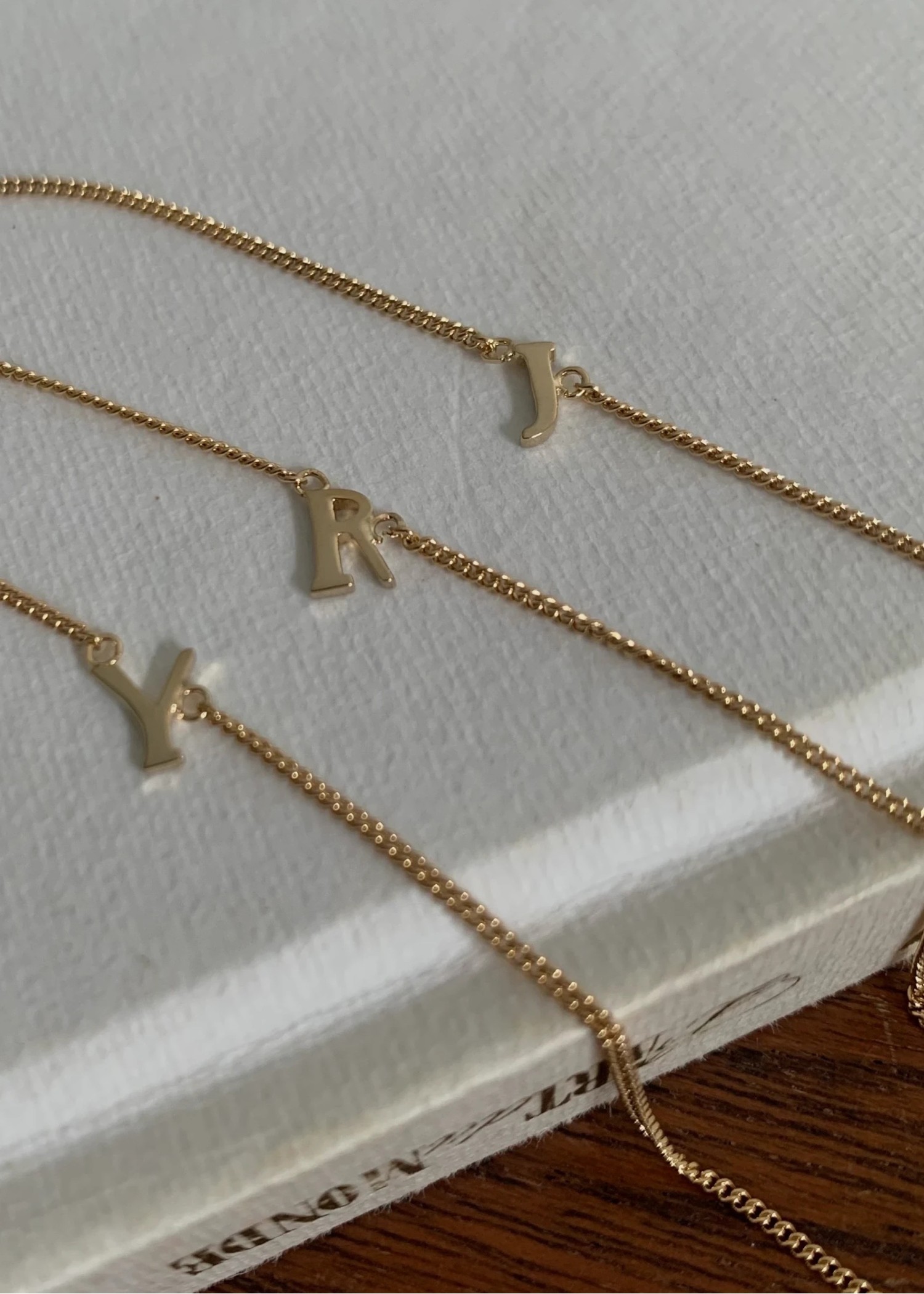 unstable initial motif bracelet