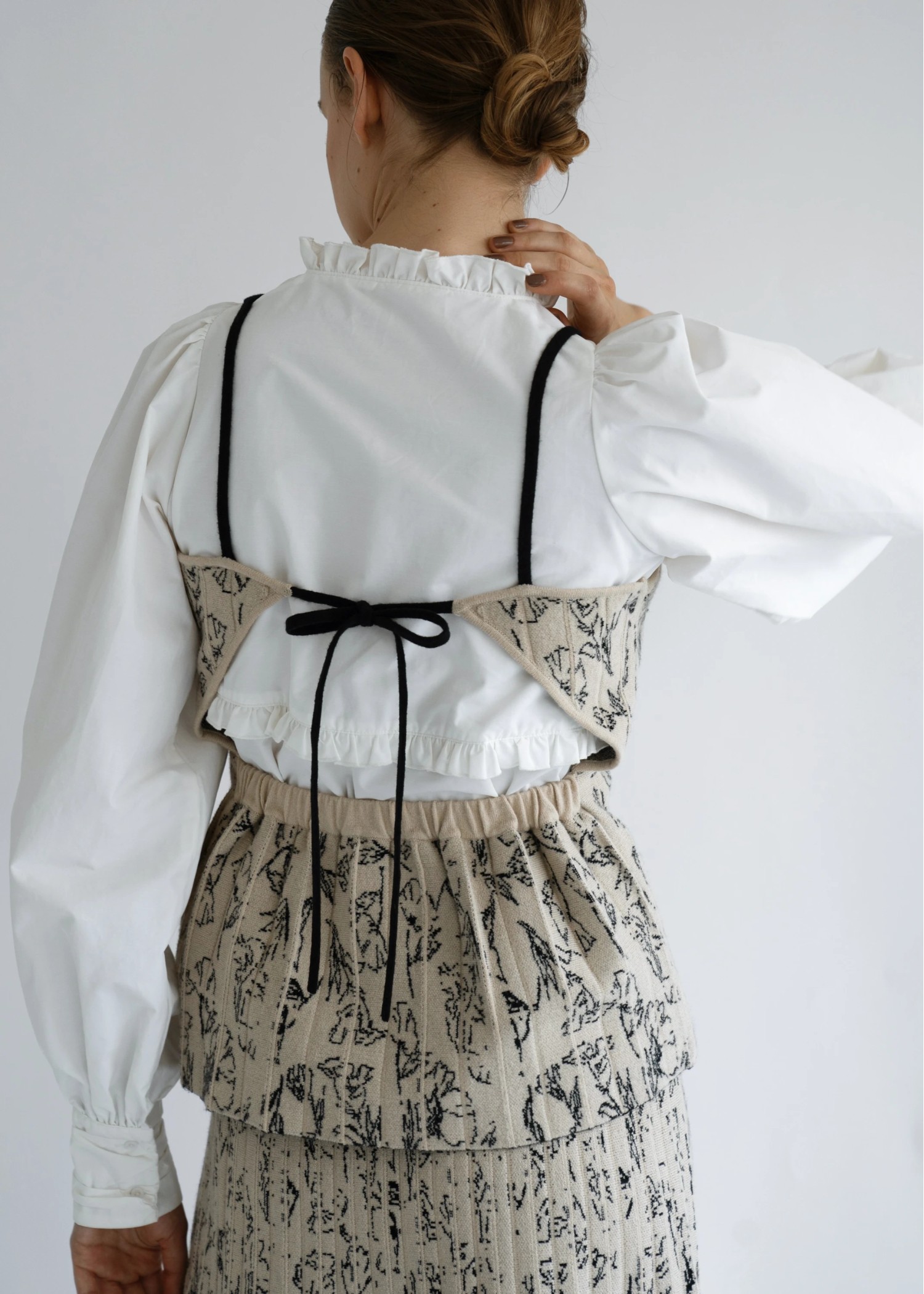 knit pleats peplum bustier