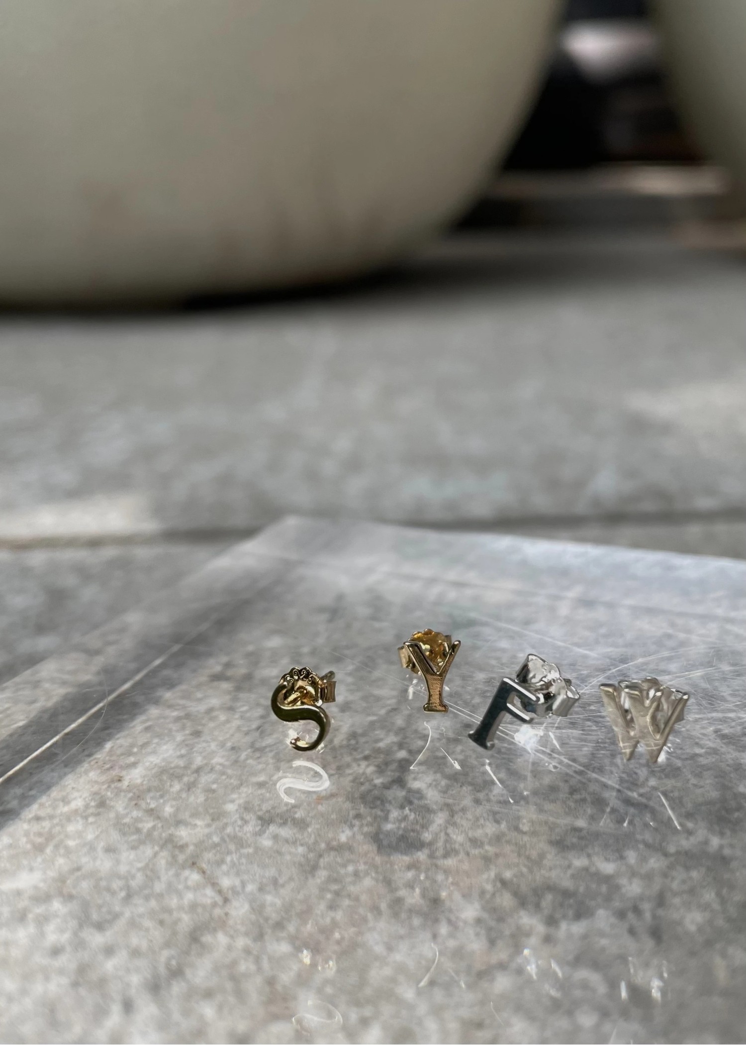 tiny bit initial motif pierce