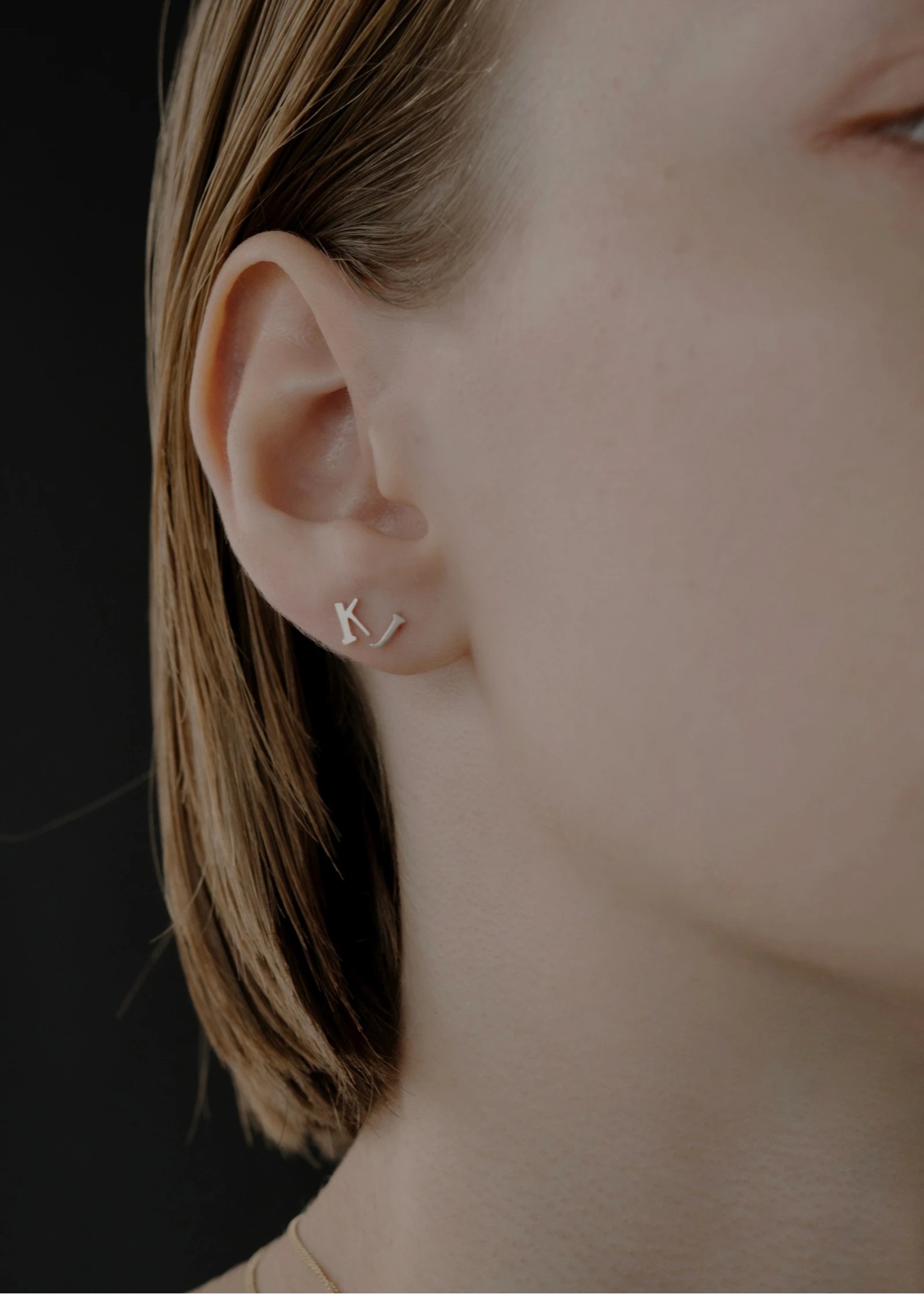 tiny bit initial motif pierce