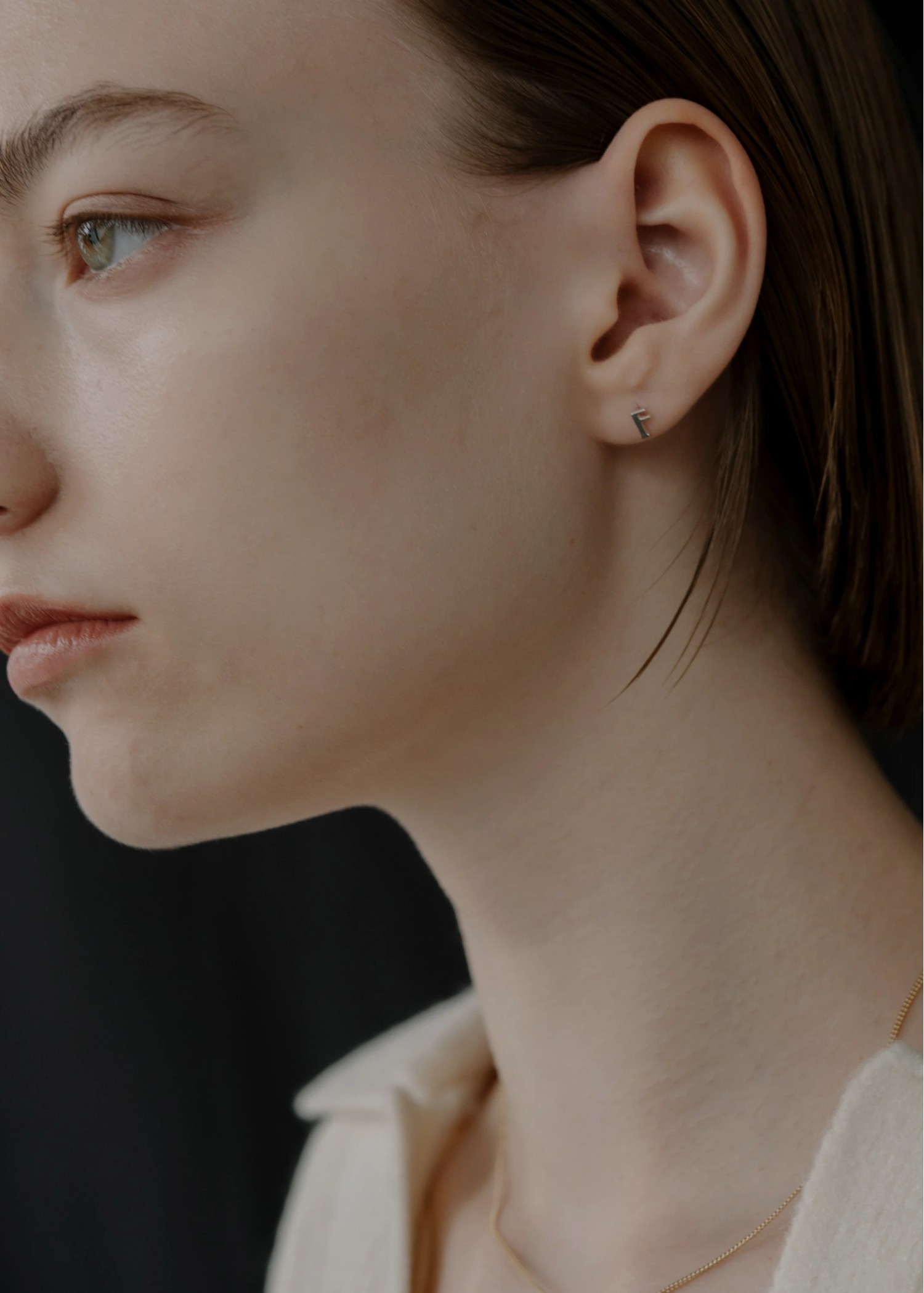 tiny bit initial motif pierce