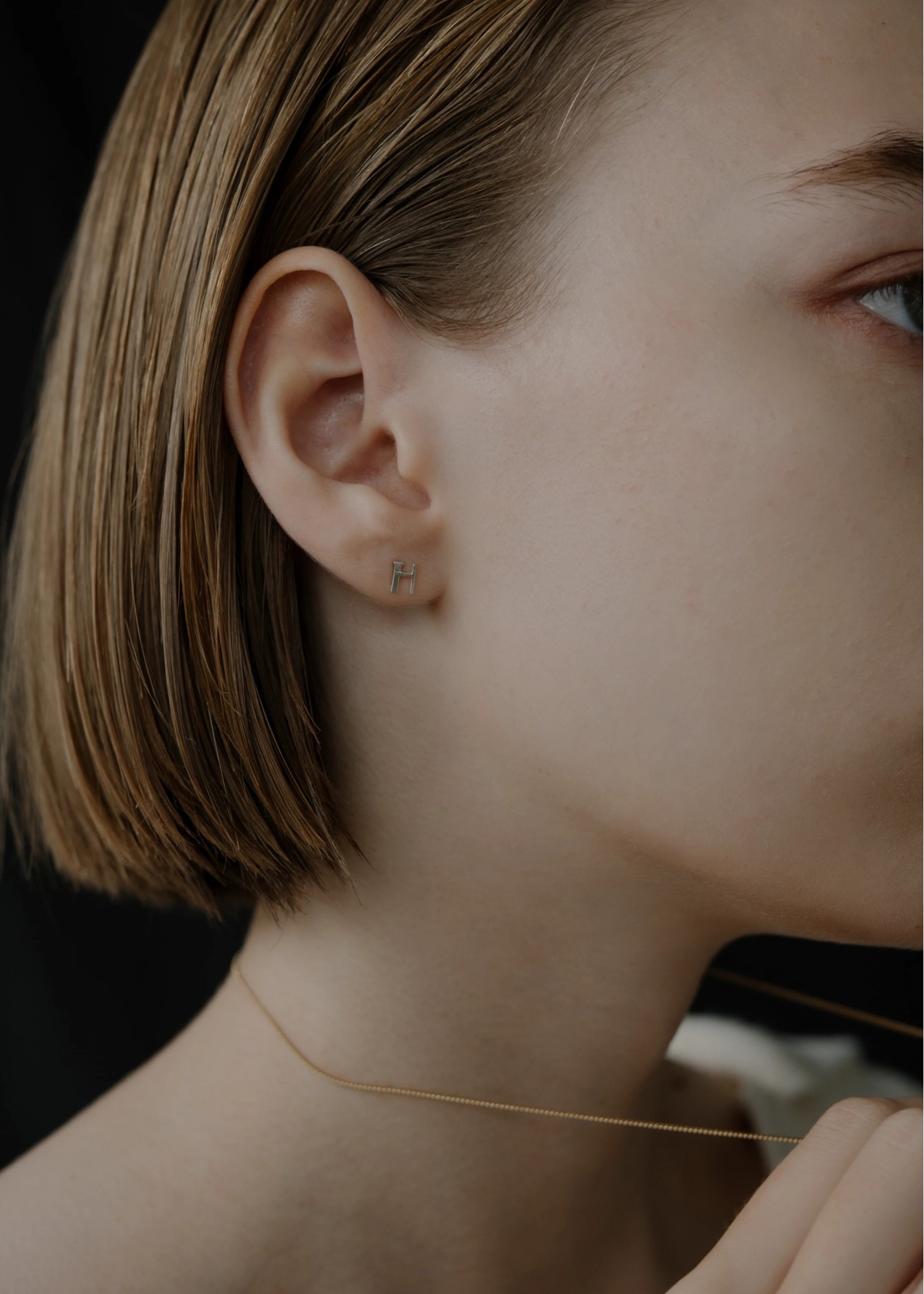 tiny bit initial motif pierce