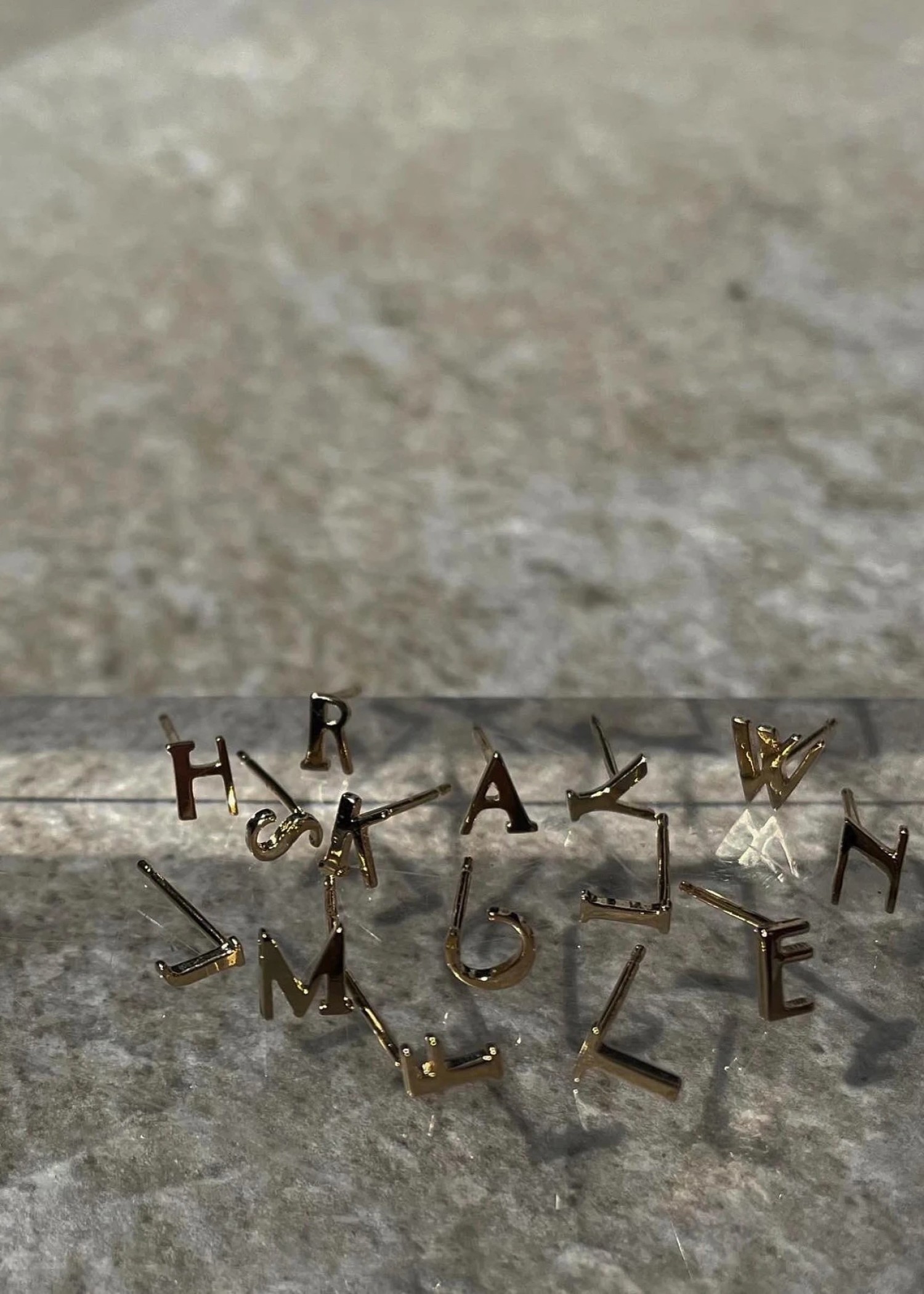 tiny bit initial motif pierce