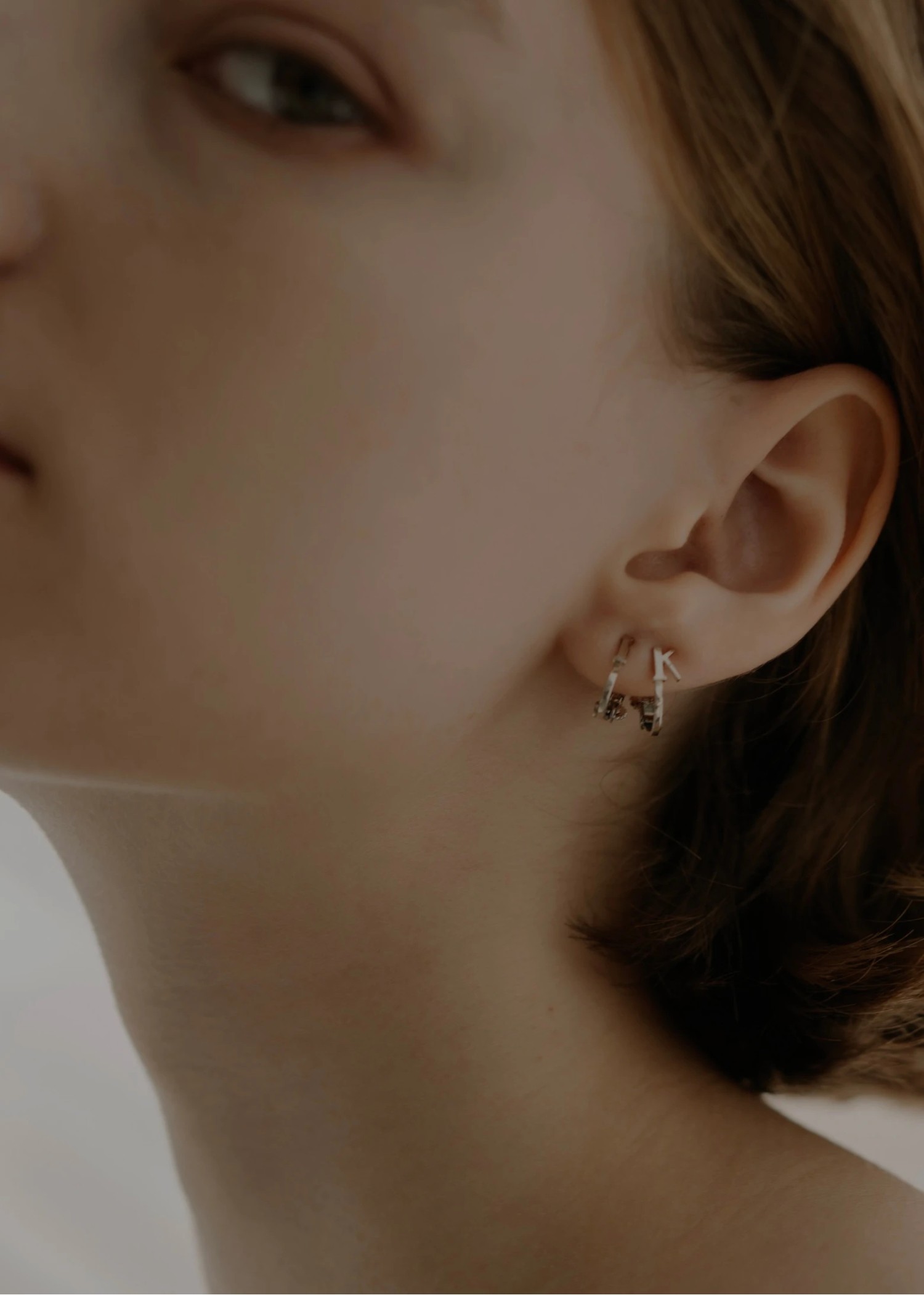 bit initial tiny motif earring