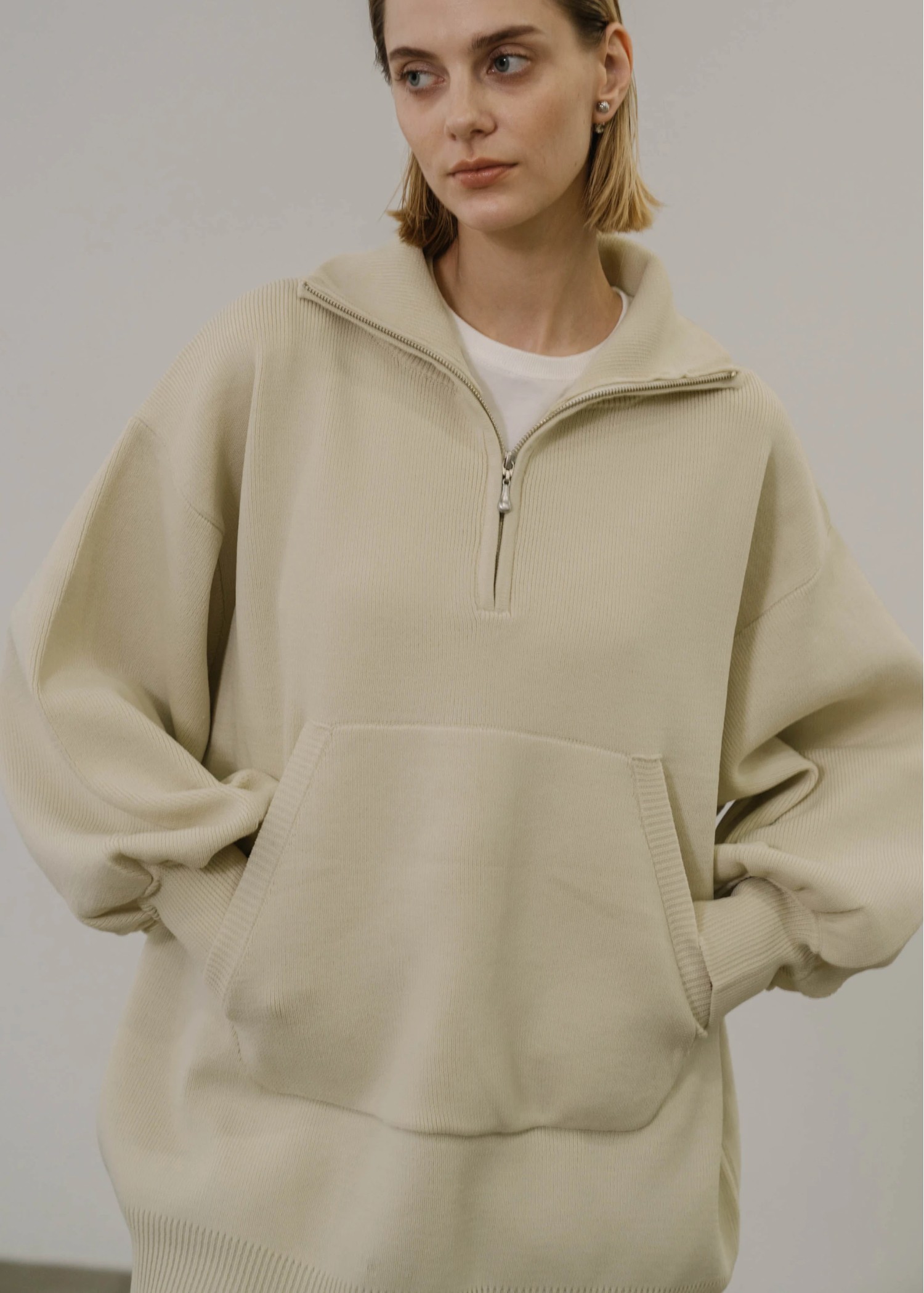 selectable aerial muff pocket half zip knit