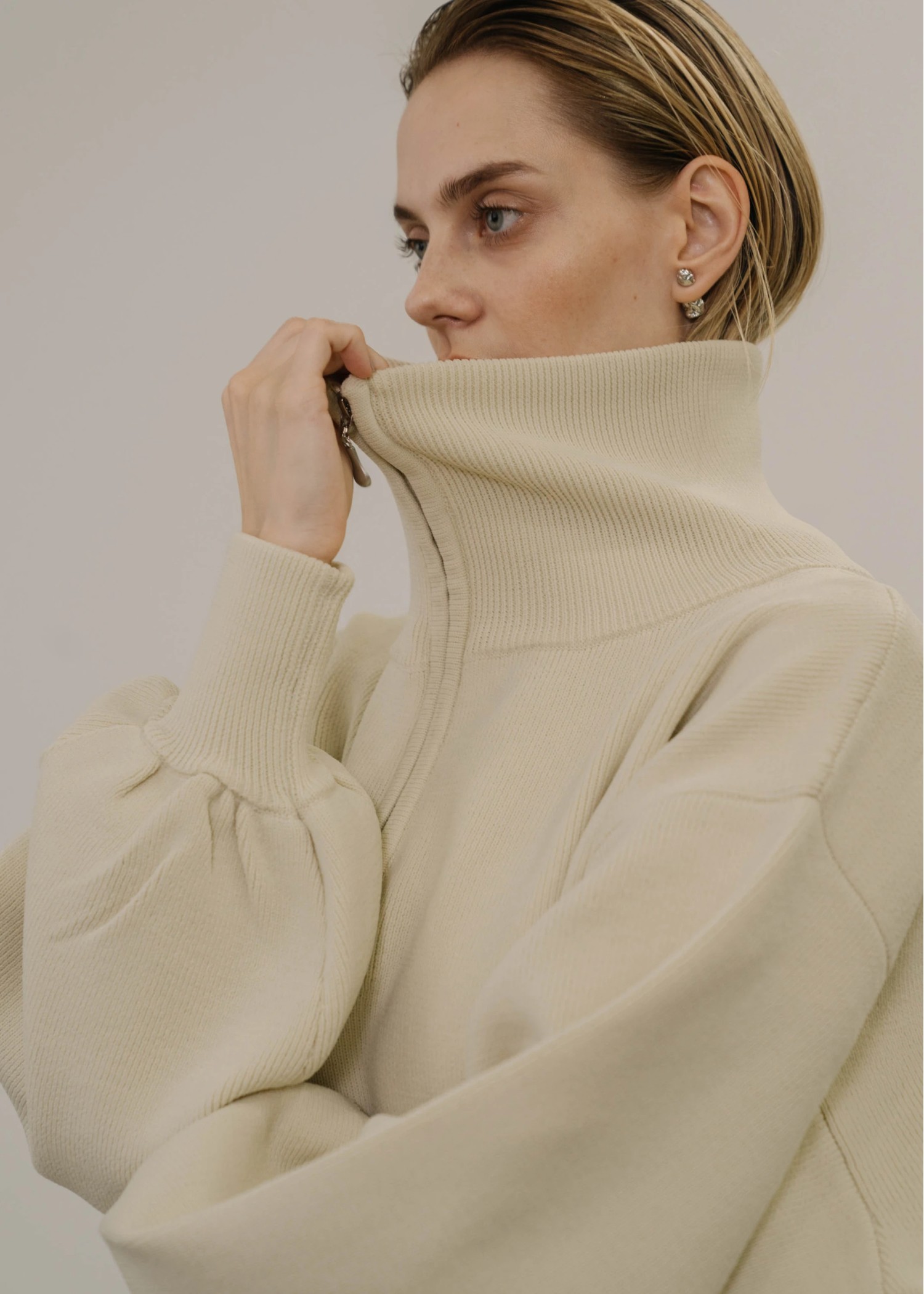 selectable aerial muff pocket half zip knit