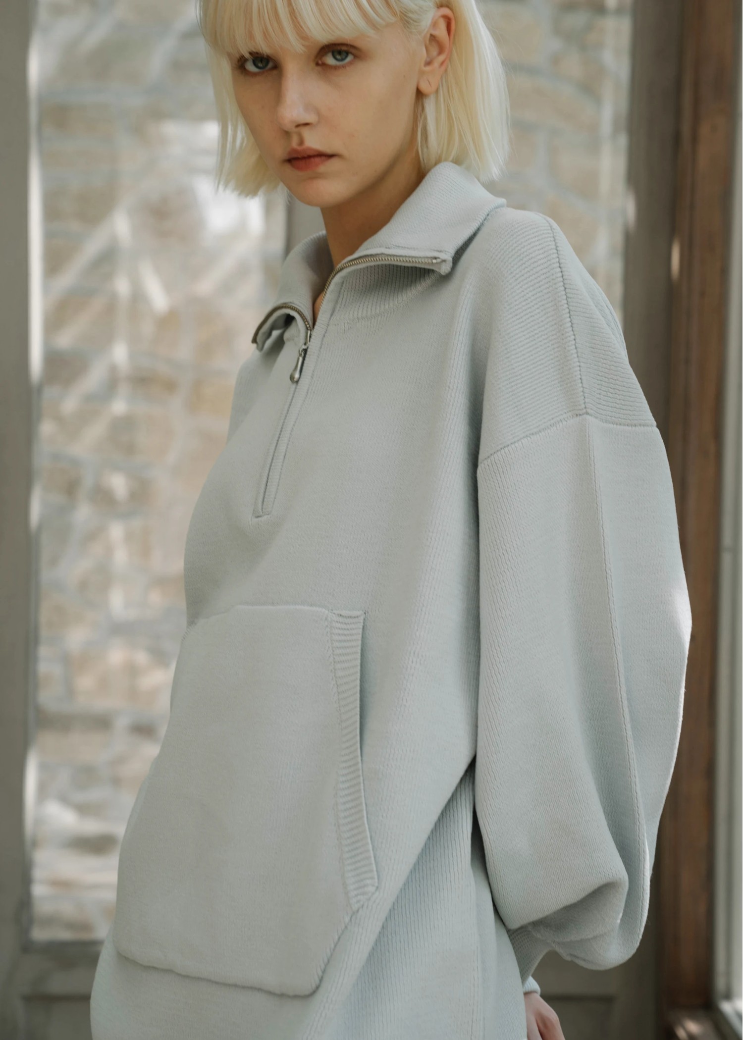 selectable aerial muff pocket half zip knit