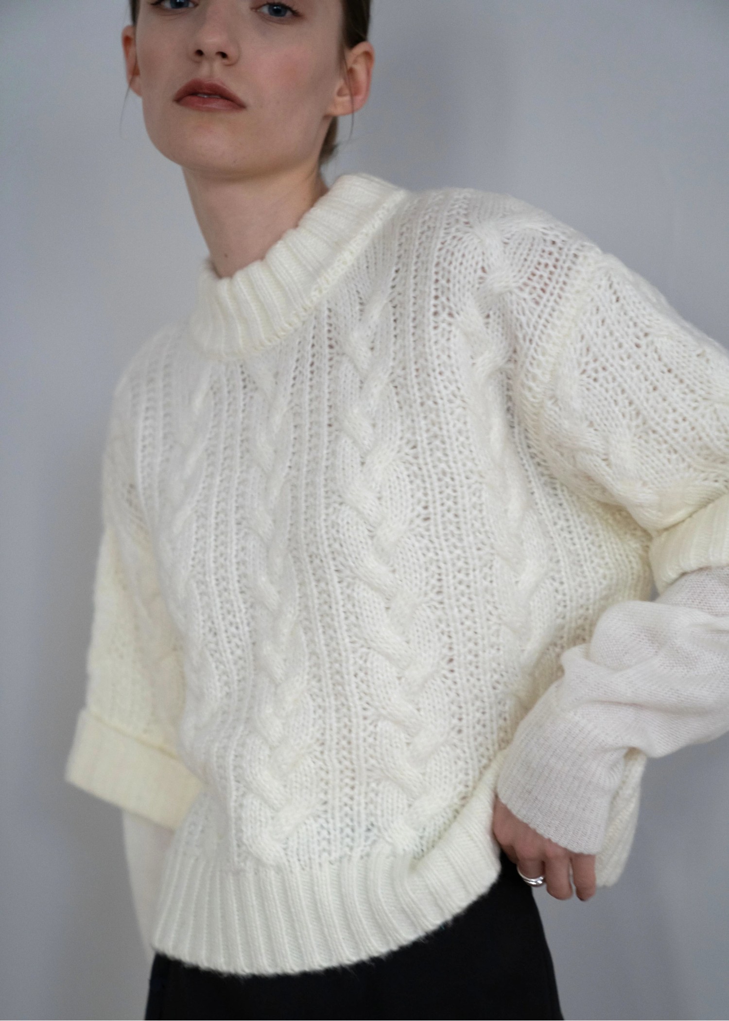 layered cable mock neck knit