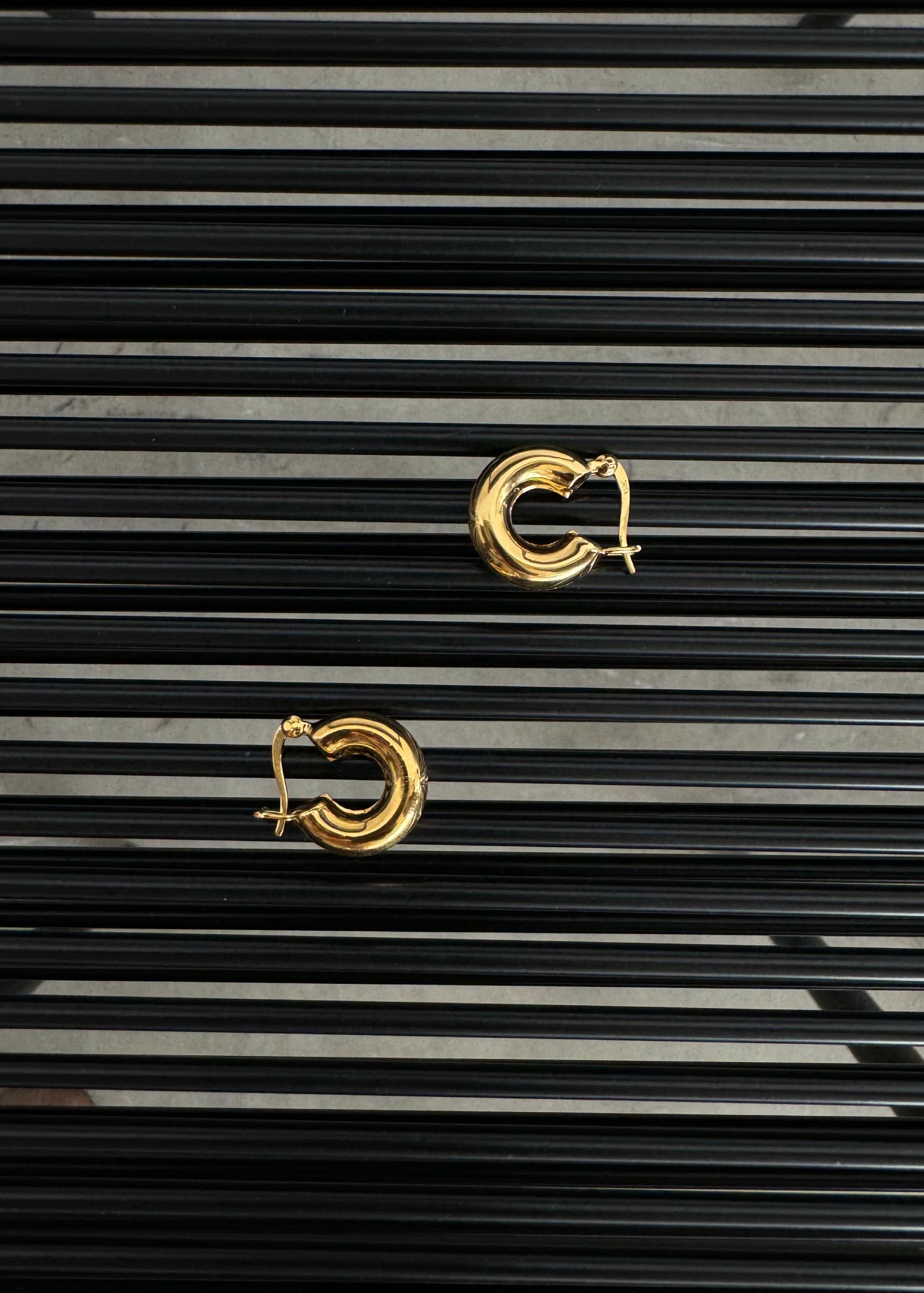 small bold mini hoop pierce