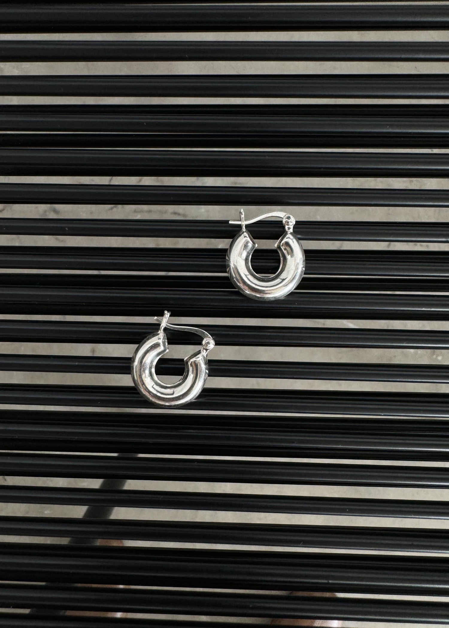 small bold mini hoop pierce