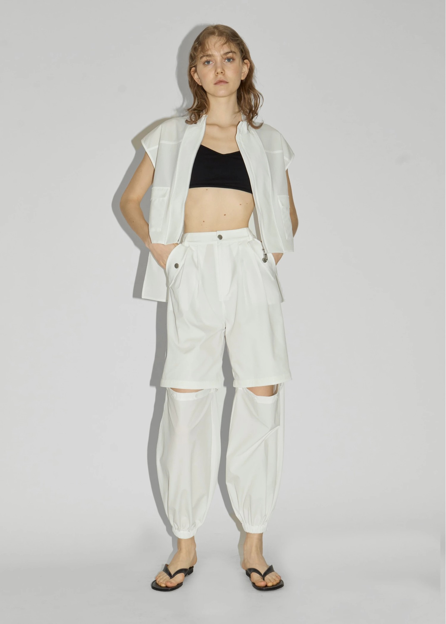 irregular hem flap pocket zip tops