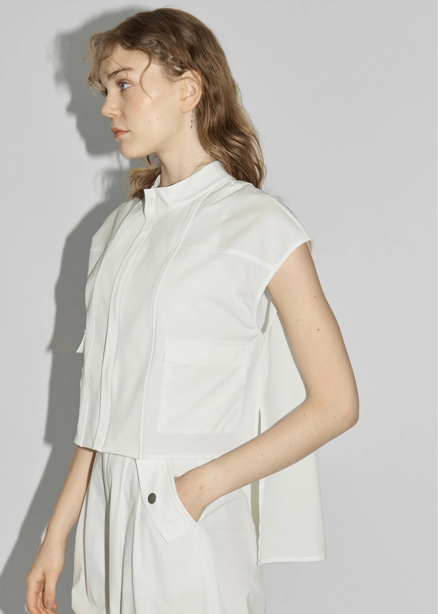 irregular hem flap pocket zip tops