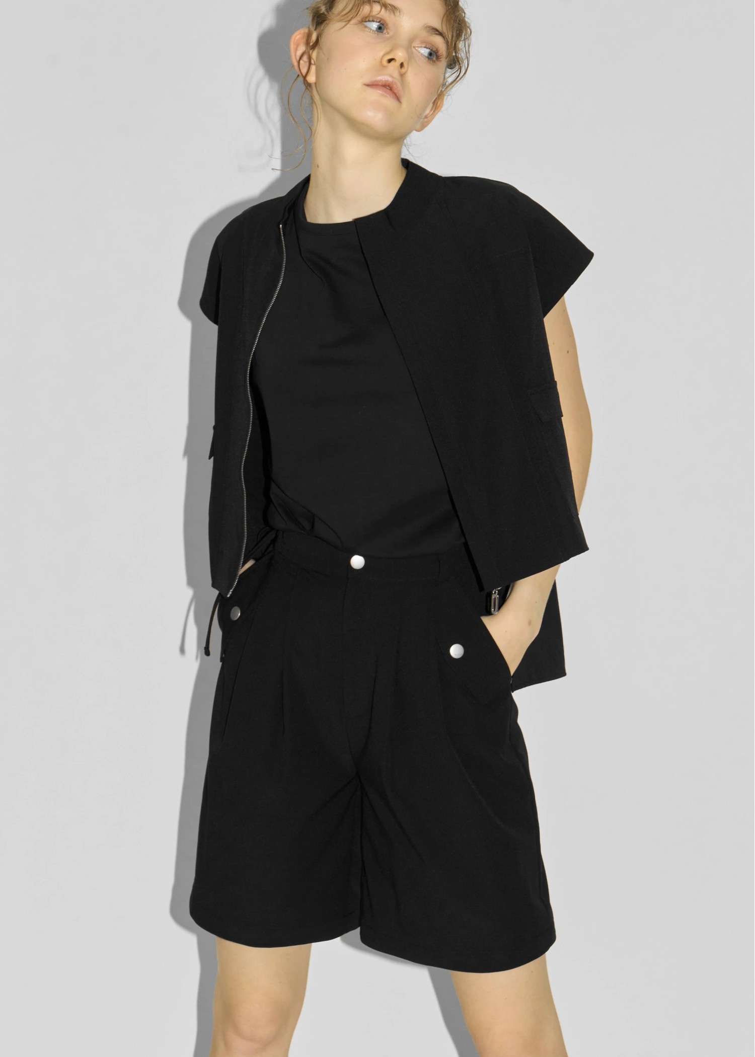 irregular hem flap pocket zip tops