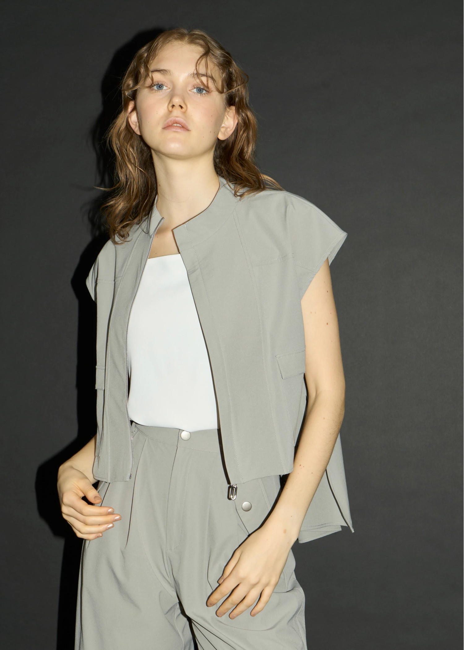 irregular hem flap pocket zip tops