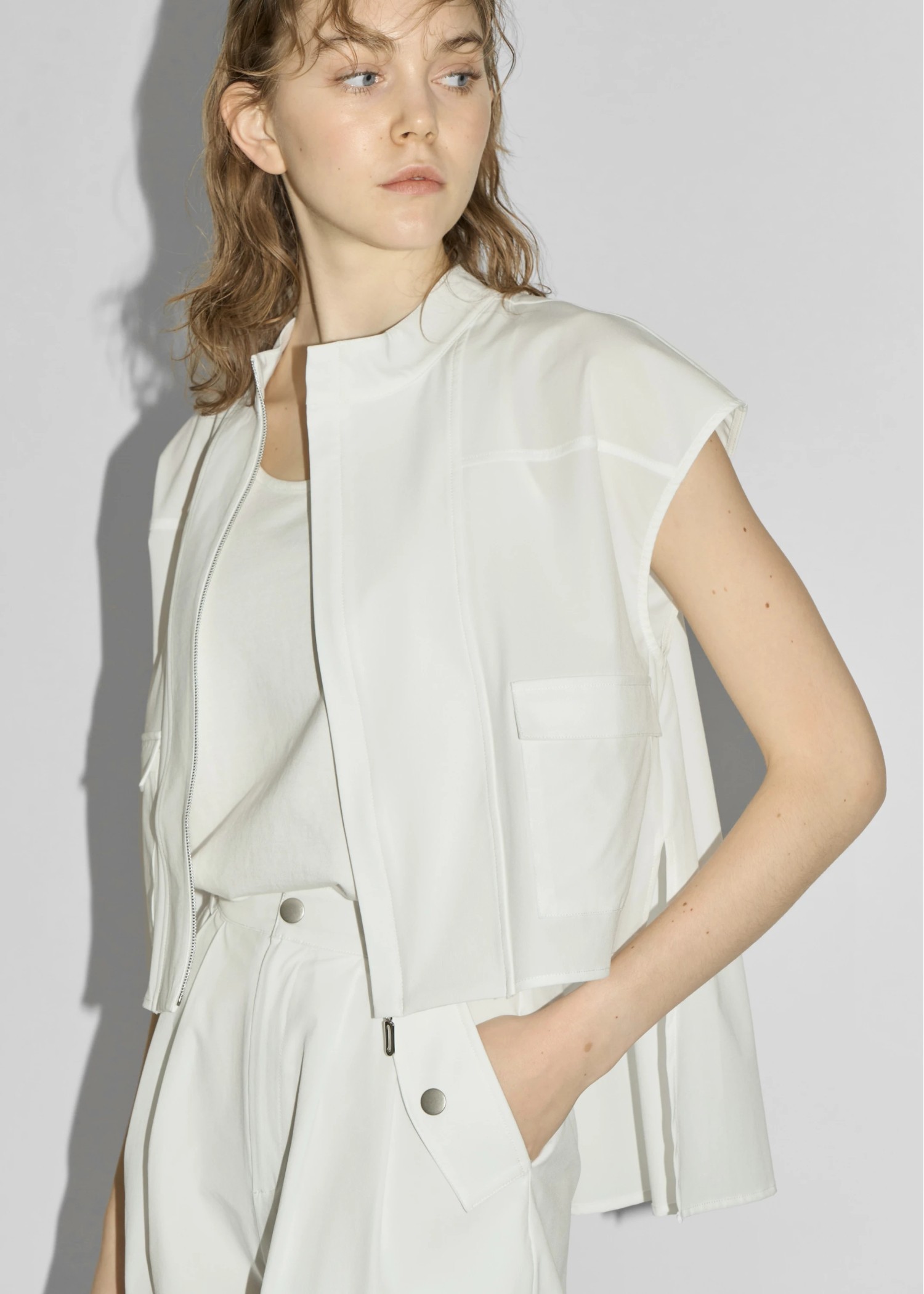 irregular hem flap pocket zip tops