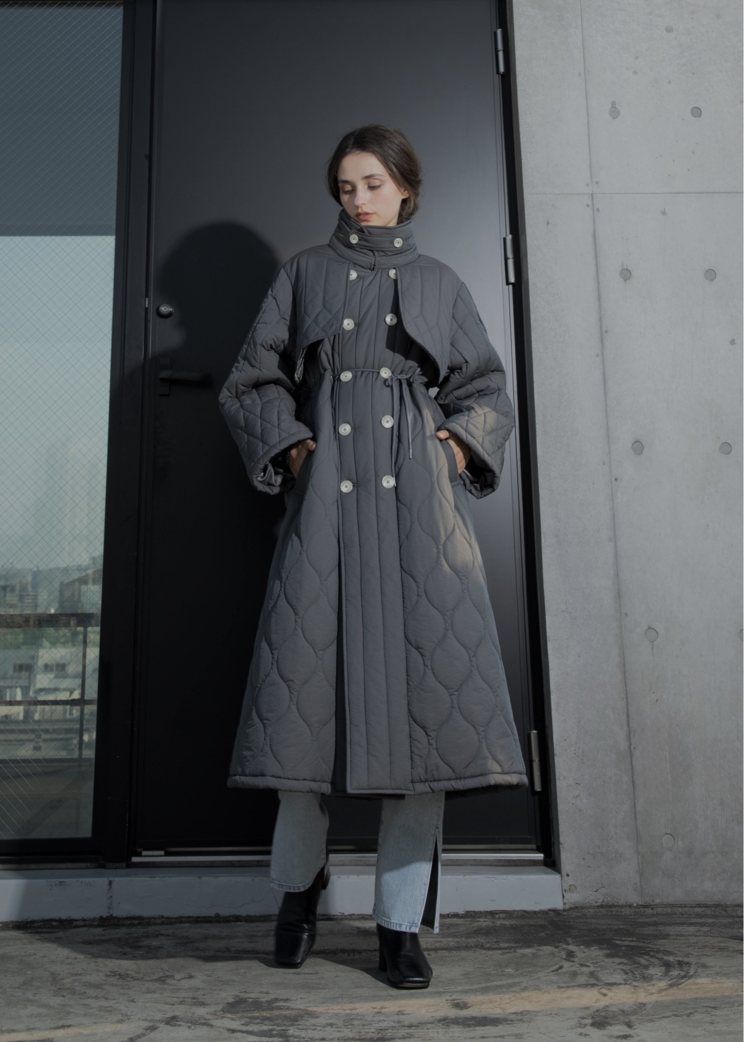 traverse quilting trench detail coat