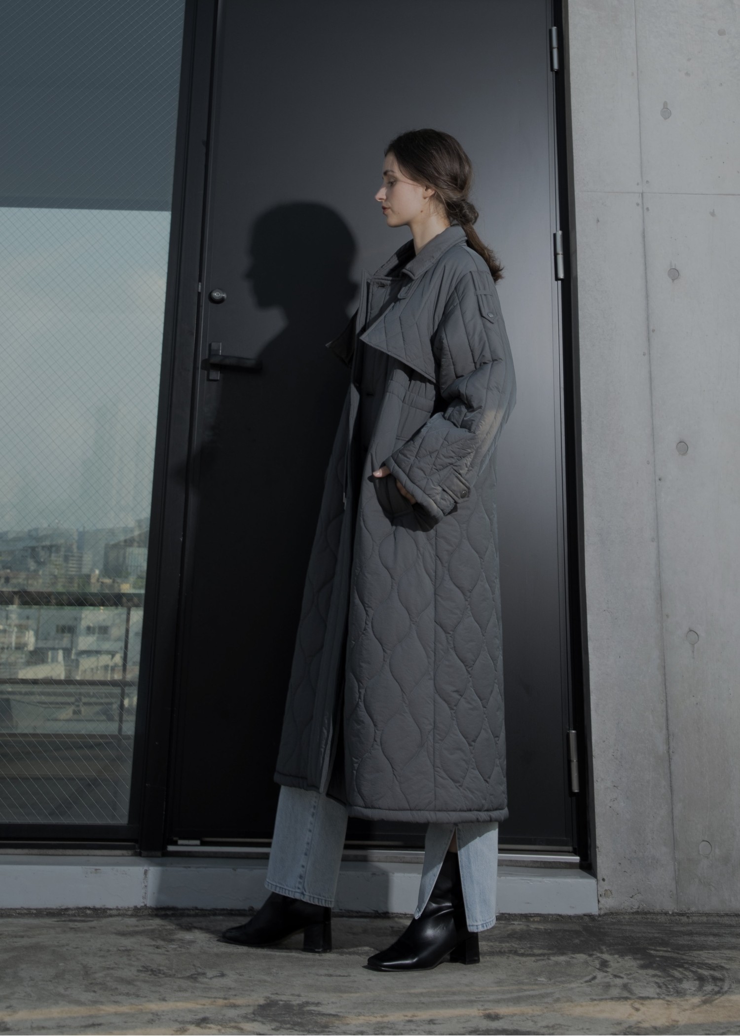 traverse quilting trench detail coat