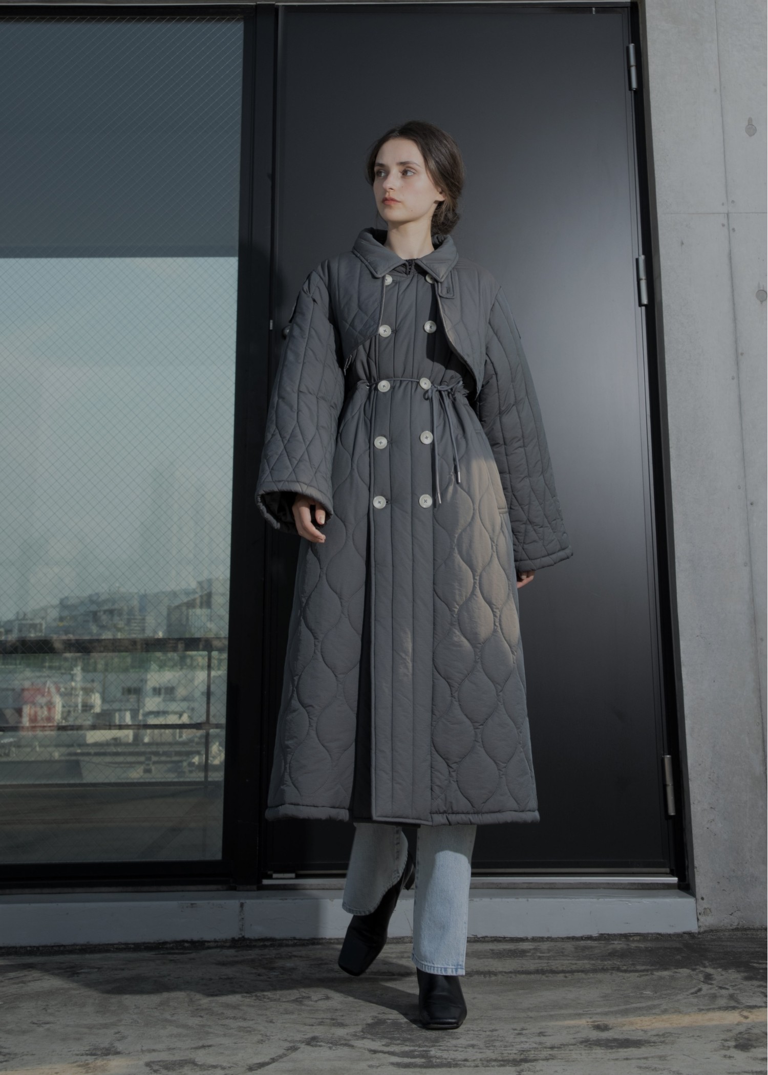traverse quilting trench detail coat