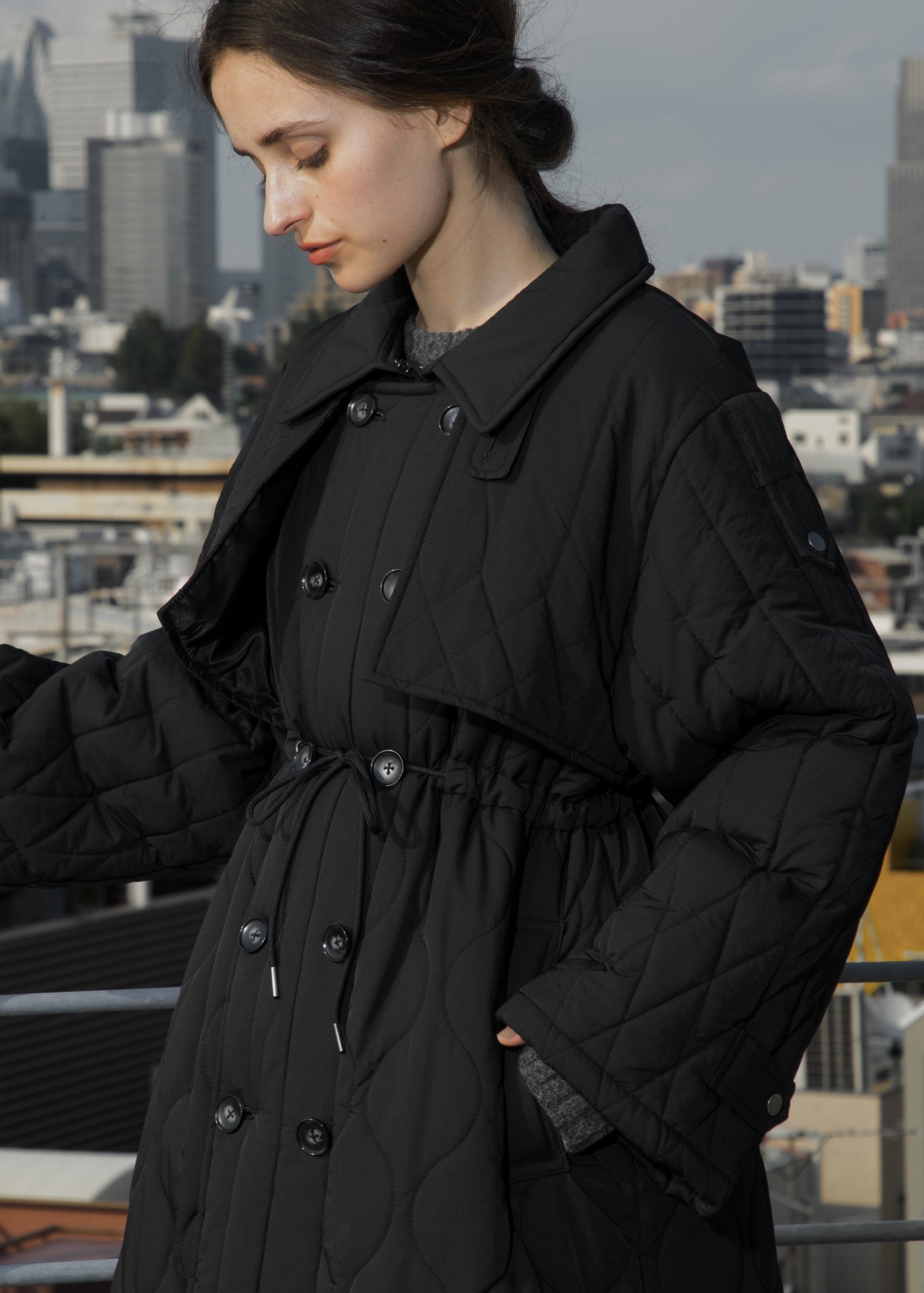 traverse quilting trench detail coat