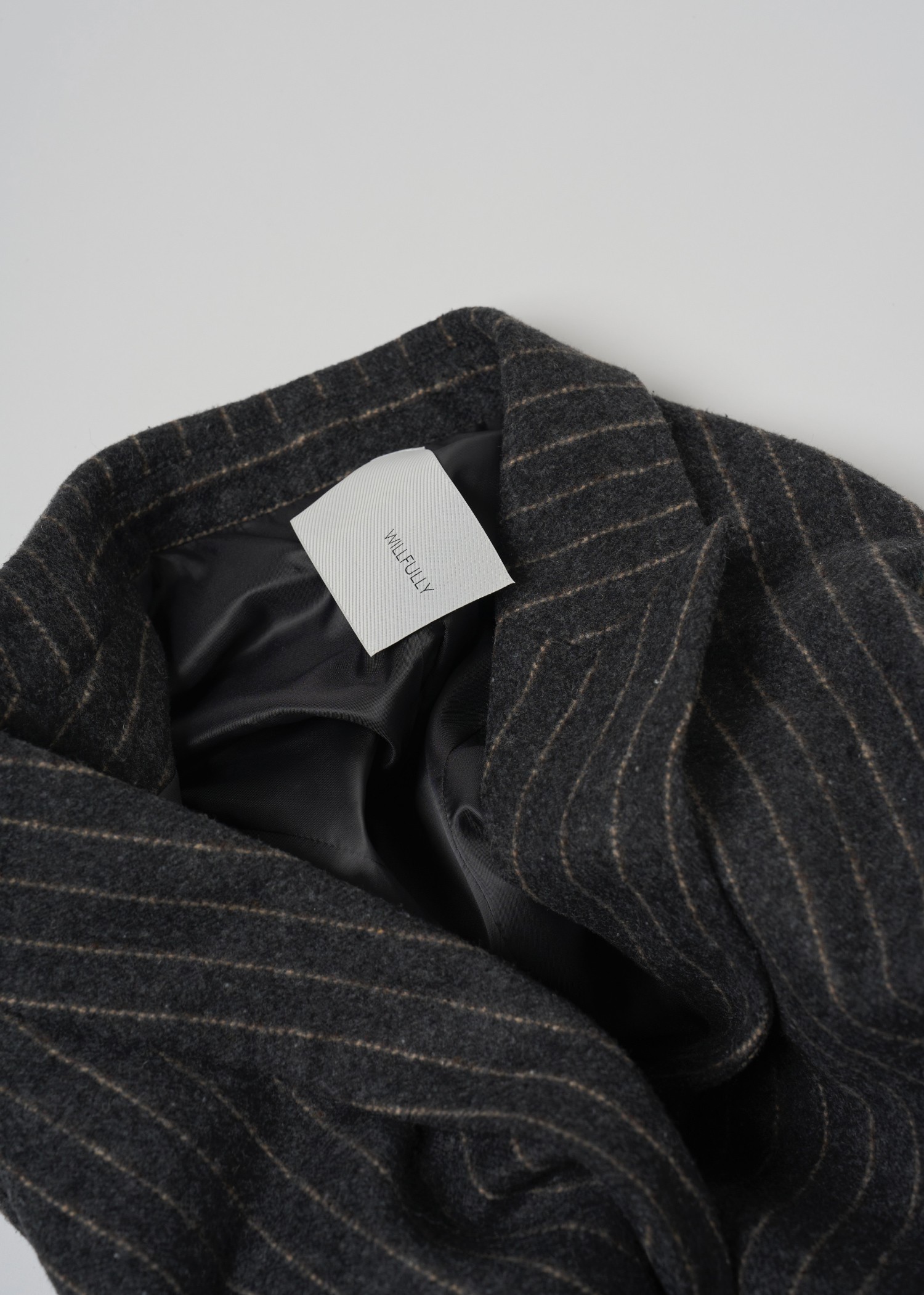 fringe material variation peaked lapel JK